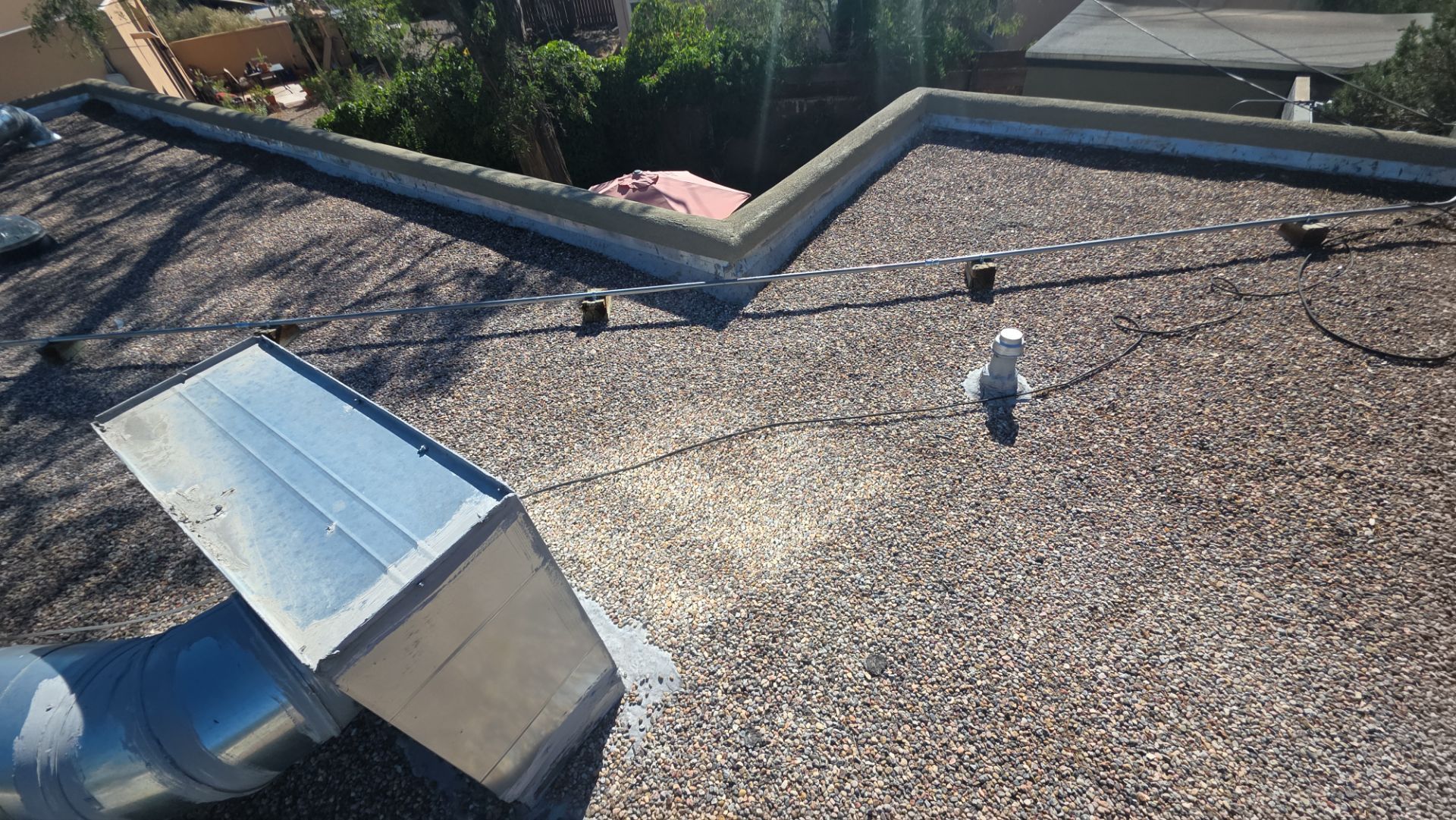 Tar and Gravel Roof Maintenance and Penetration Sealing in Albuquerque by Doyle Roof Masters Inc