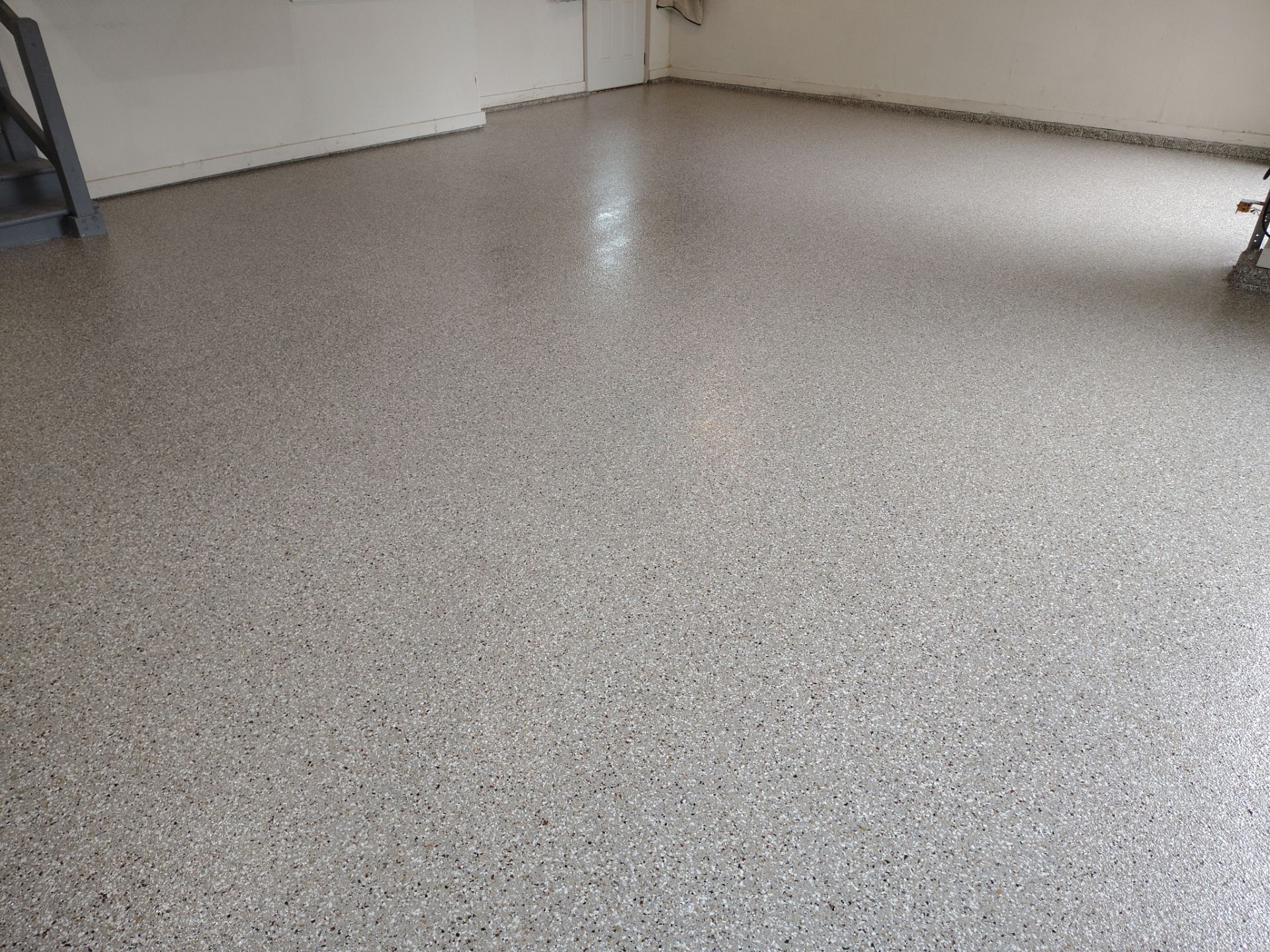 Residential Garage Floor Coating and Concrete Repair in Johnston by Revival Concrete Coatings