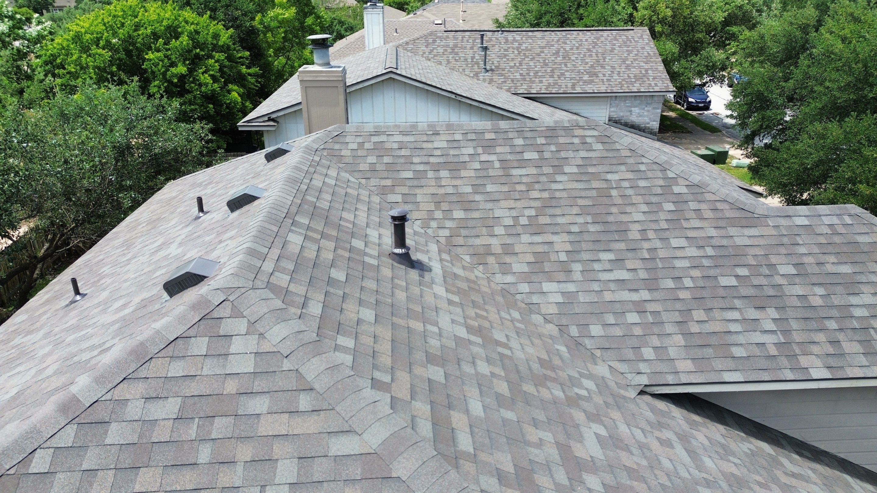 Roof Replacement & Chimney Cricket Upgrade in Cedar Park, TX by Kstylez Roofing & Construction