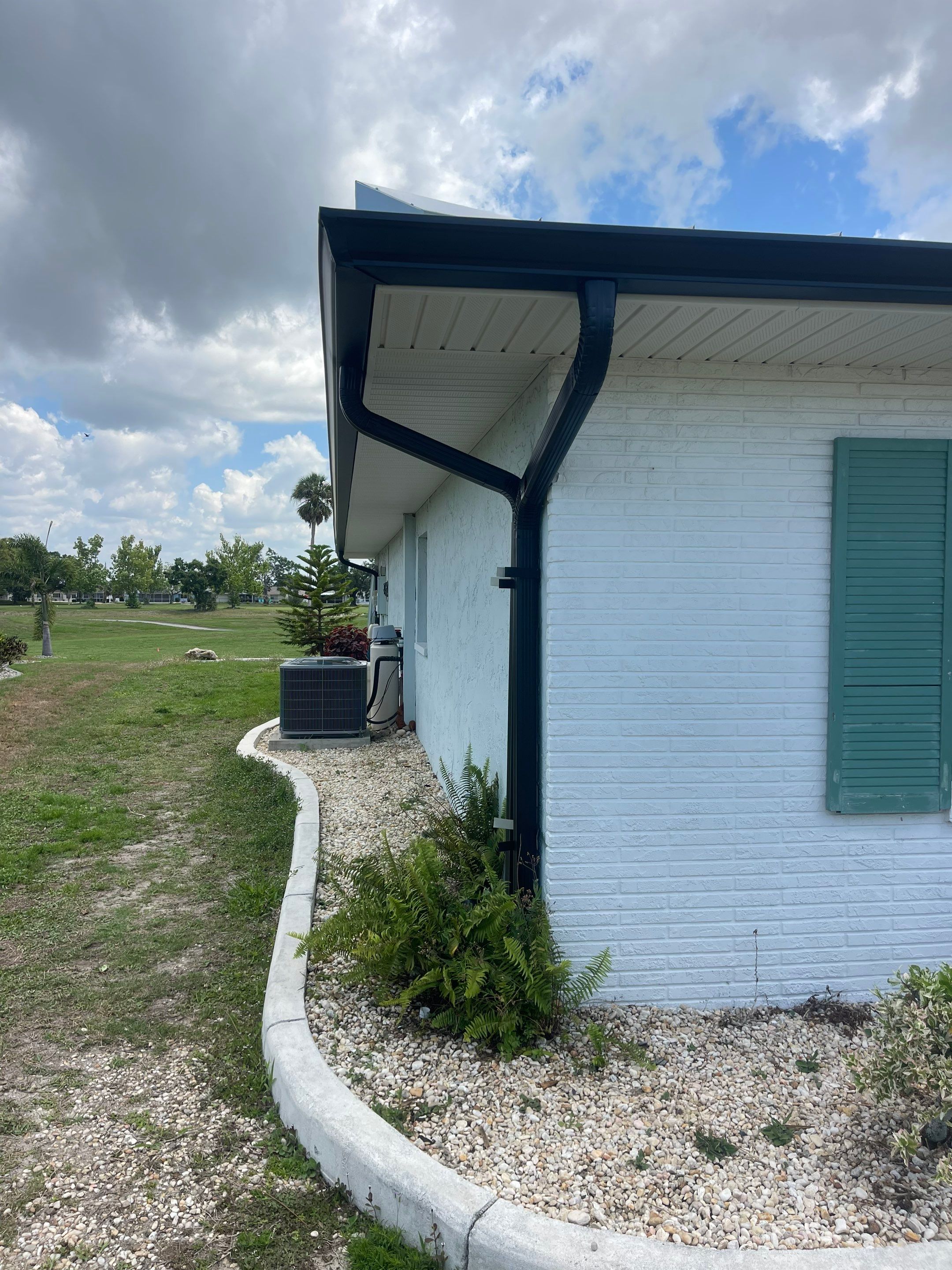 Black Aluminum Gutters Installation in Sun City Center FL by Gutter Professors
