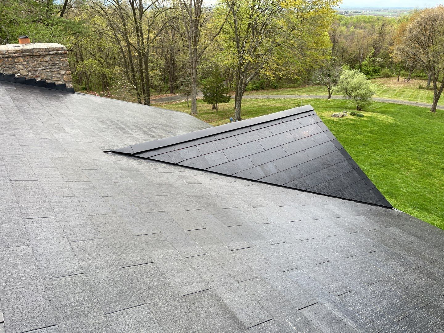 Tesla Solar Roof Replacement by American Home Contractors
