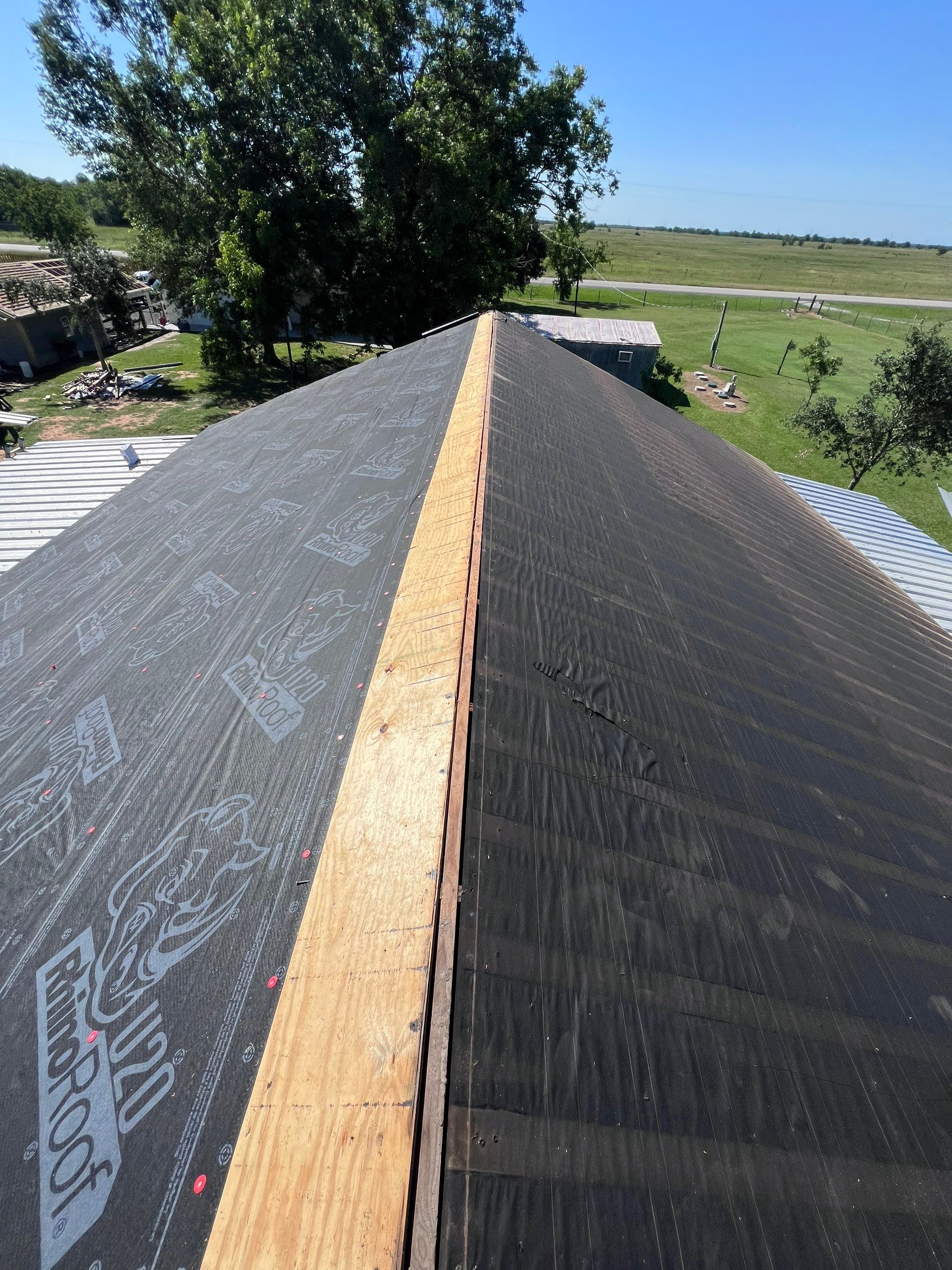Residential Roofing Installation using Metal by Roof Repair Company