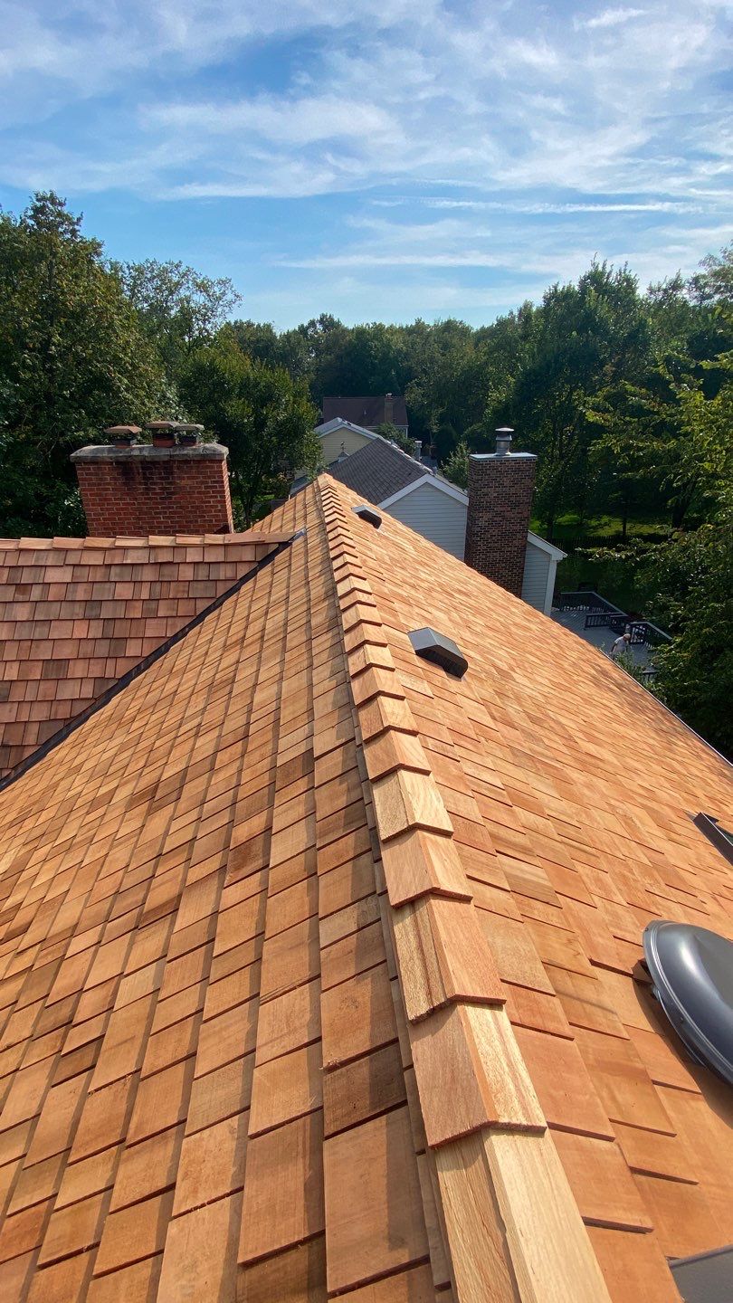 Cedar Shake Roof Replacement by Custom Installations