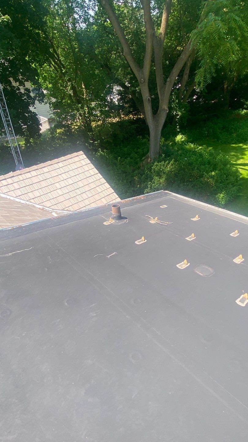 DaVinci Roof Installation with Snow Guards in Oconomowoc Lake by Custom Installations