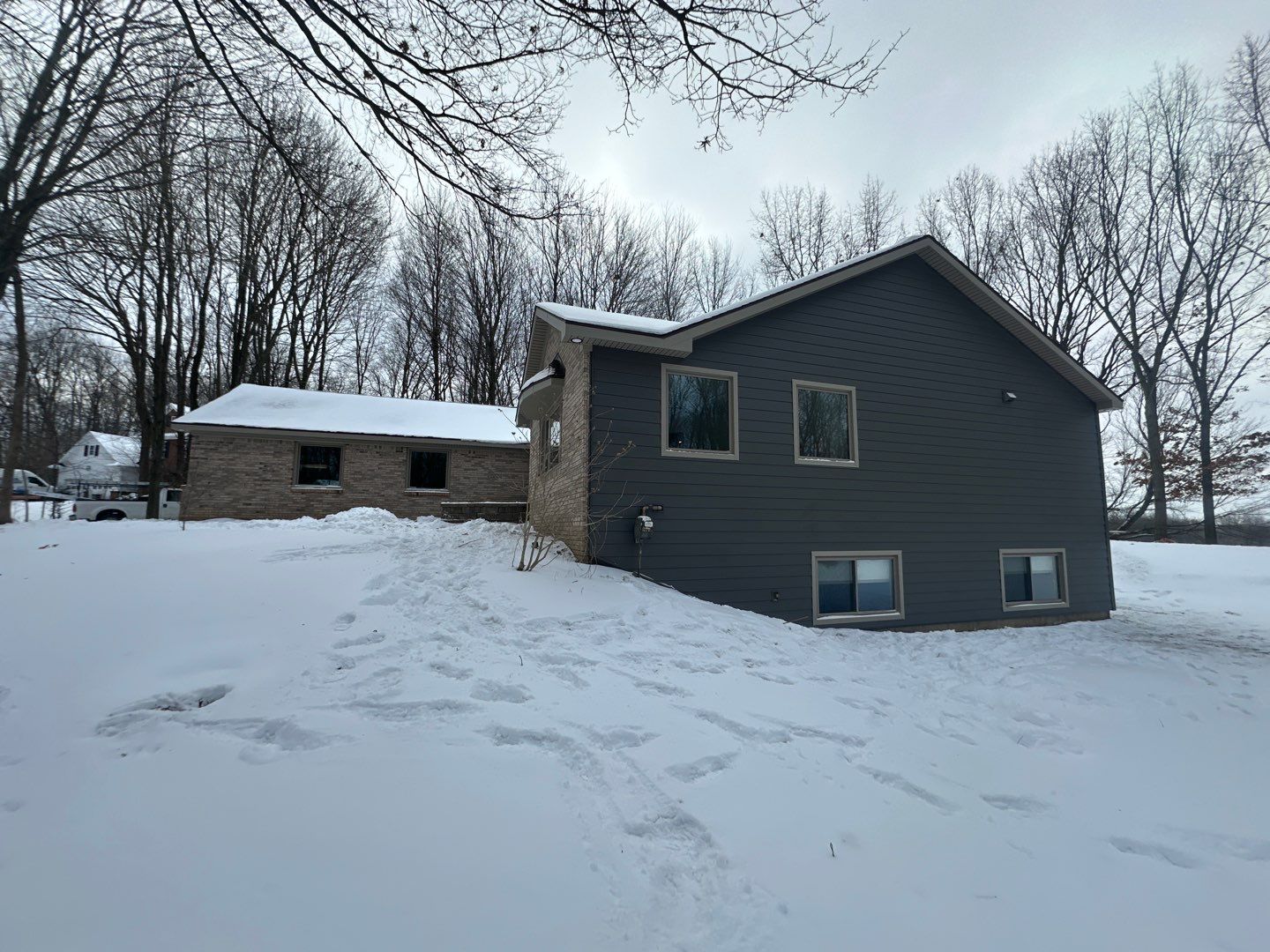 Siding Replacement using Alside S7 Cedar Mill Grain Composite by 180 Contractors