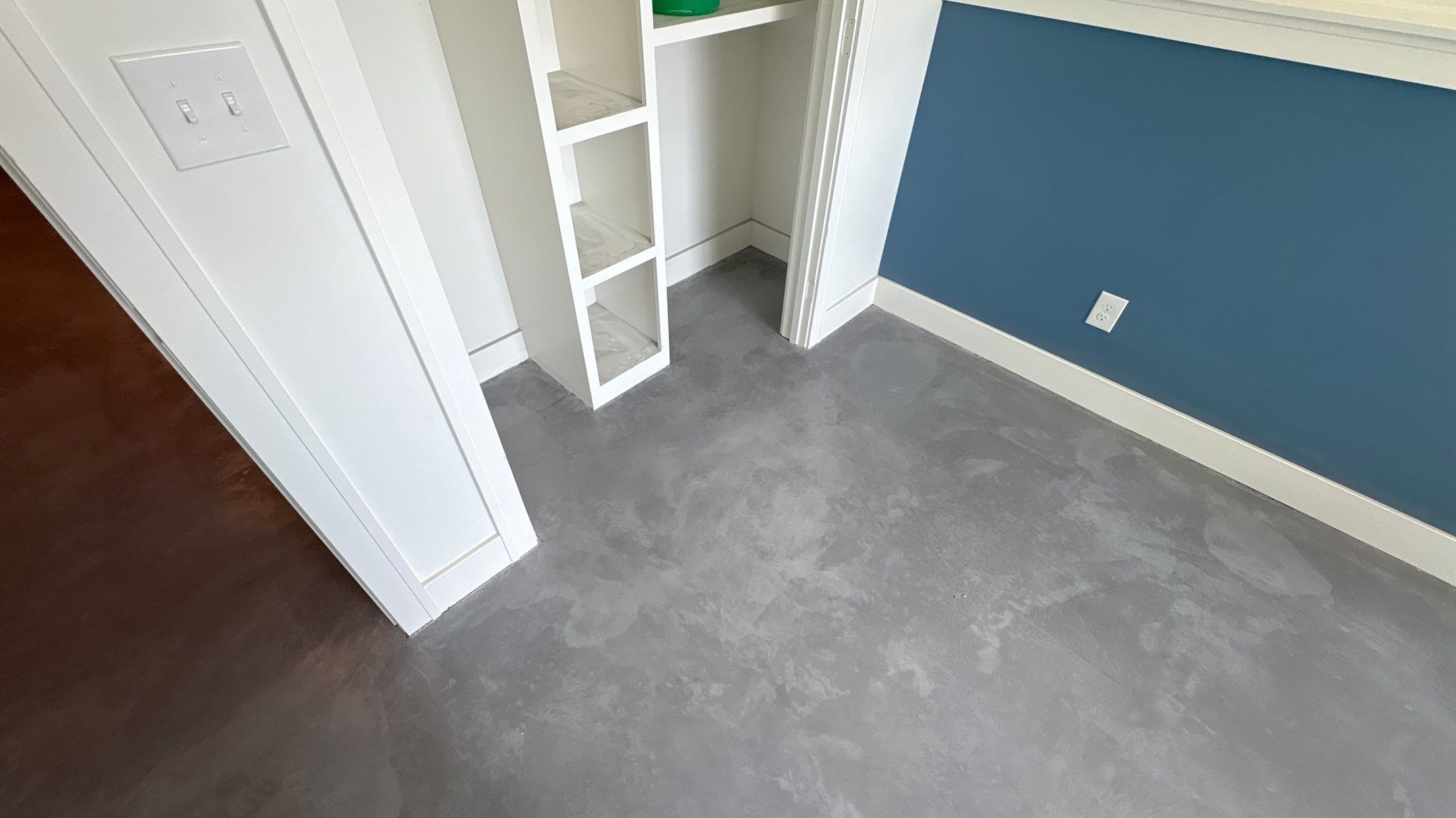 Basement Floor Overlay - Lawrence, KS by Big Red Decorative Concrete, LLC