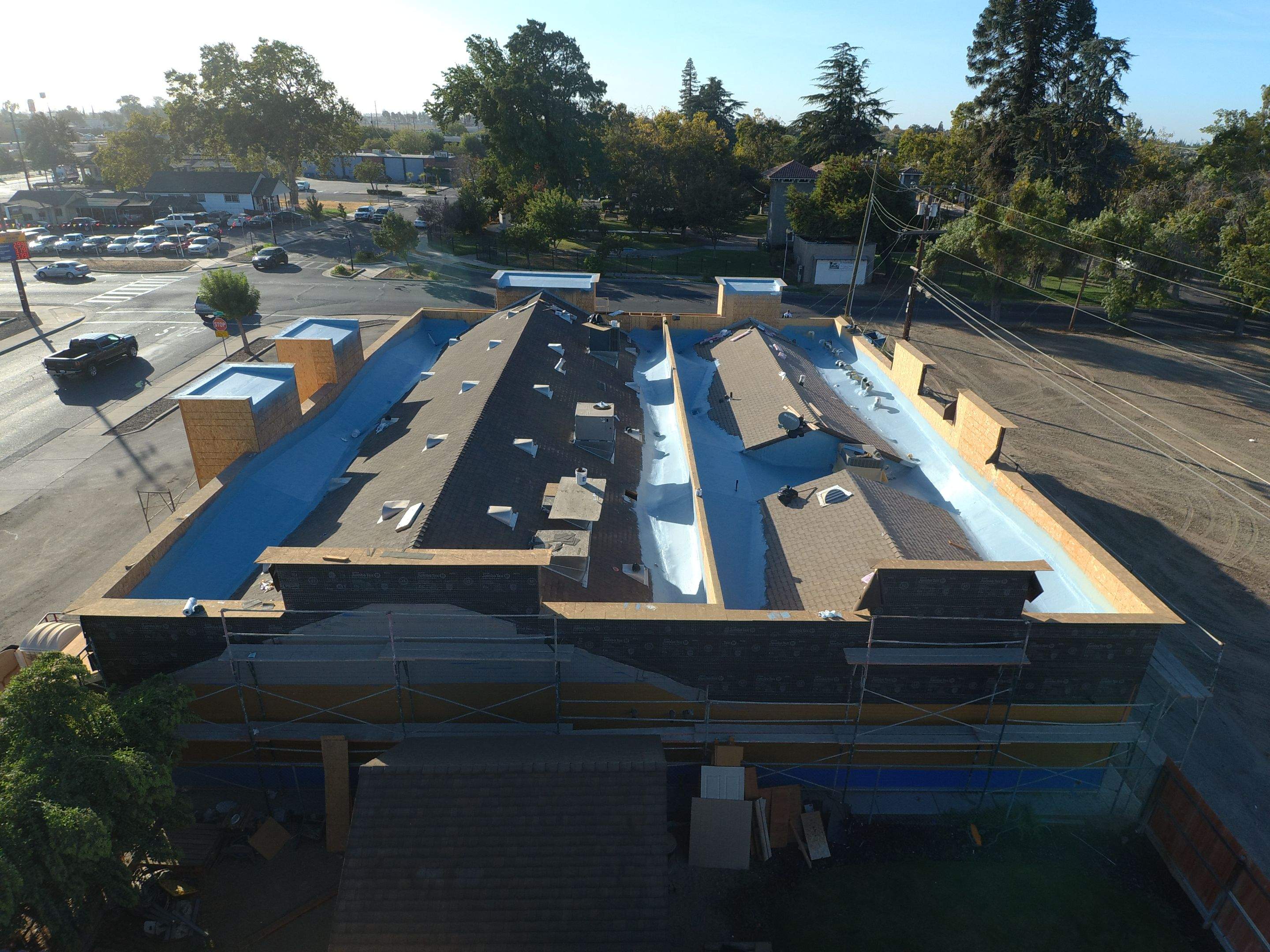 Spray foam and coatings using Conklin Benchmark/PUMA XL coatings and spray foam by Straight Edge Roofing Inc