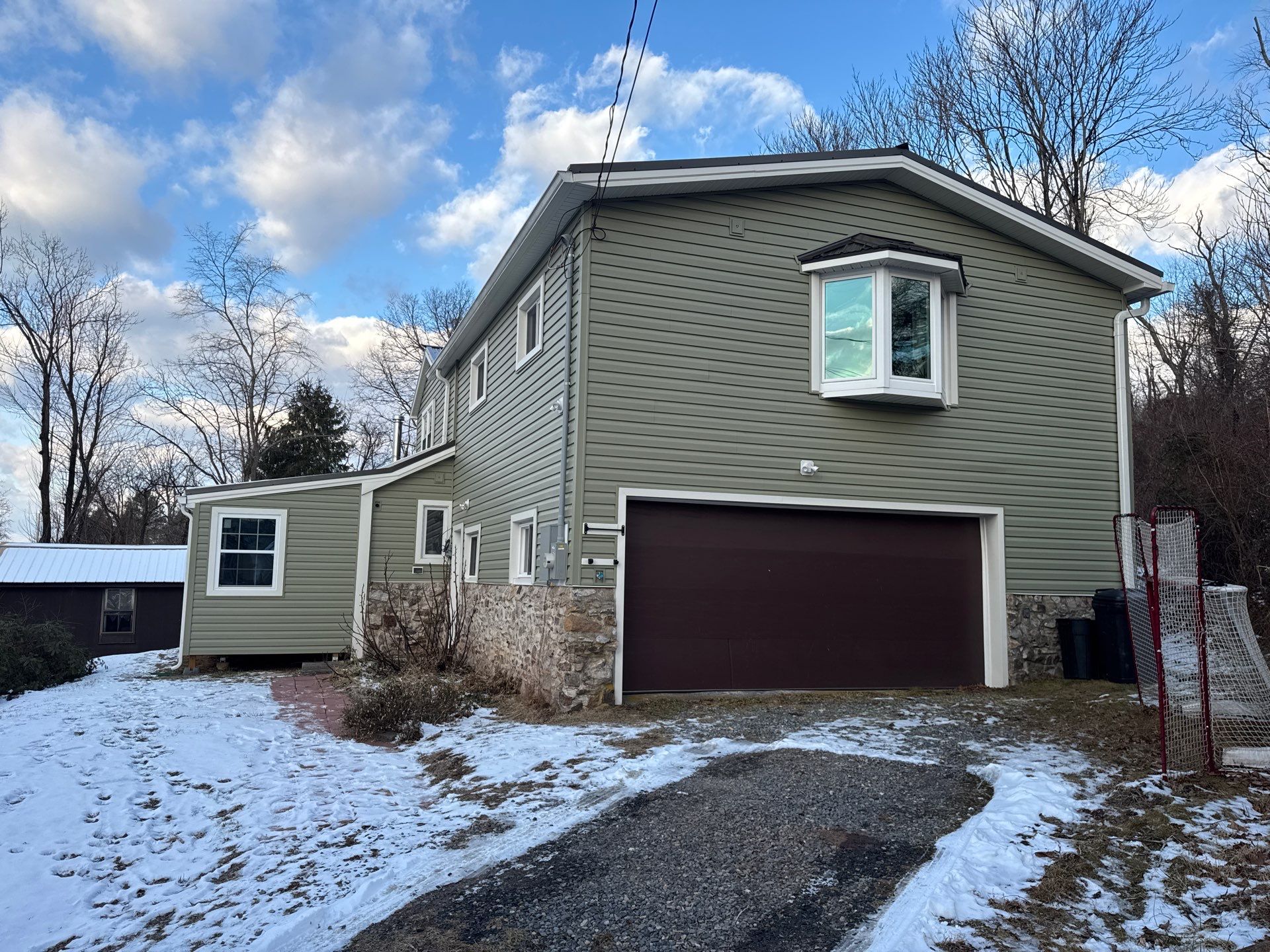 Whole-Home Exterior Transformation and Addition in Halifax by Esh Builders