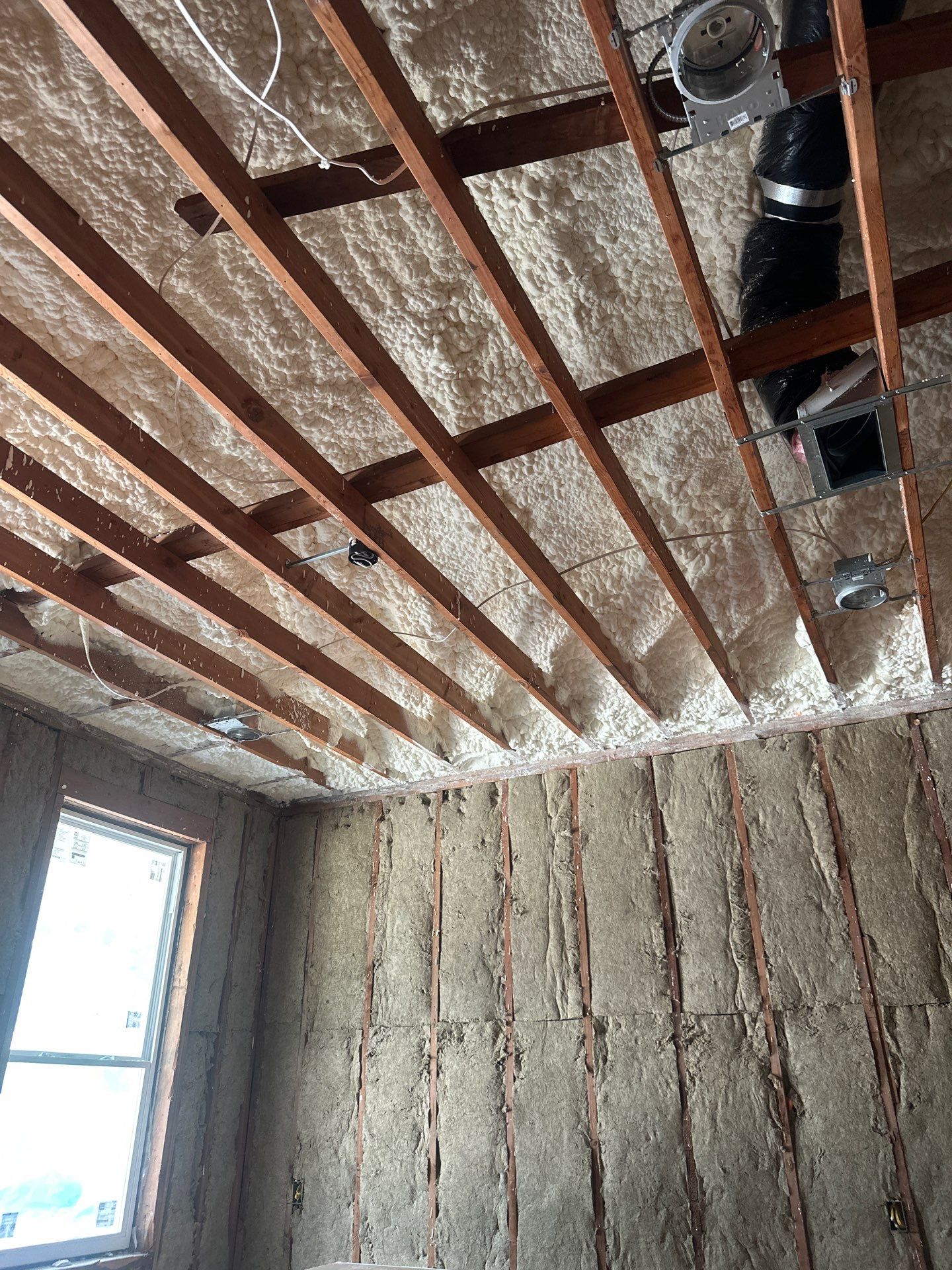 Open cell spray foam & rockwool job completed in Dallas TX by Apex Insulation Solutions
