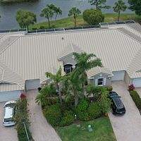 24ga 1.5" Mechanical Seam Sierra Tan by Total Roofing System The Metal Roof Experts