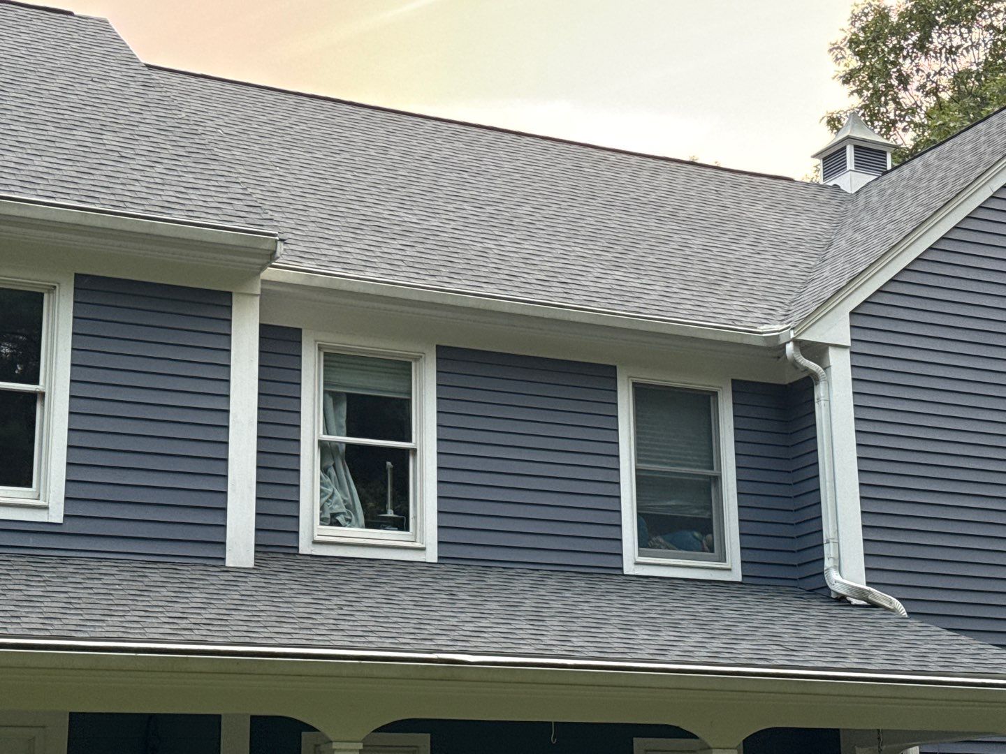 Solar-Ready Roof Replacement with GAF Pewter Gray Shingles & VELUX Skylights by Sensible Home Solutions