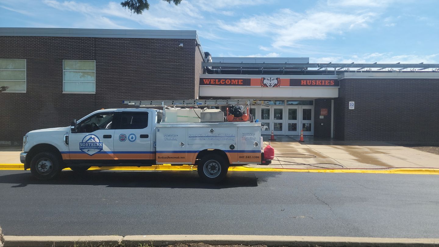 commercial pressure washing using Algaecide, soft wash soap by Northern Power Washing LLC.
