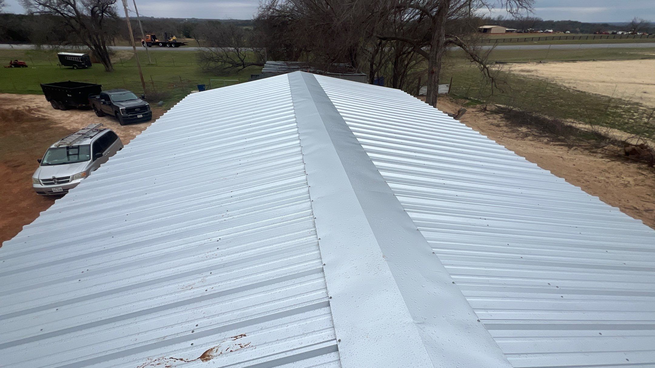 Residential Roofing Installation using PBR Metal Roof by Harvey Roofing & Construction