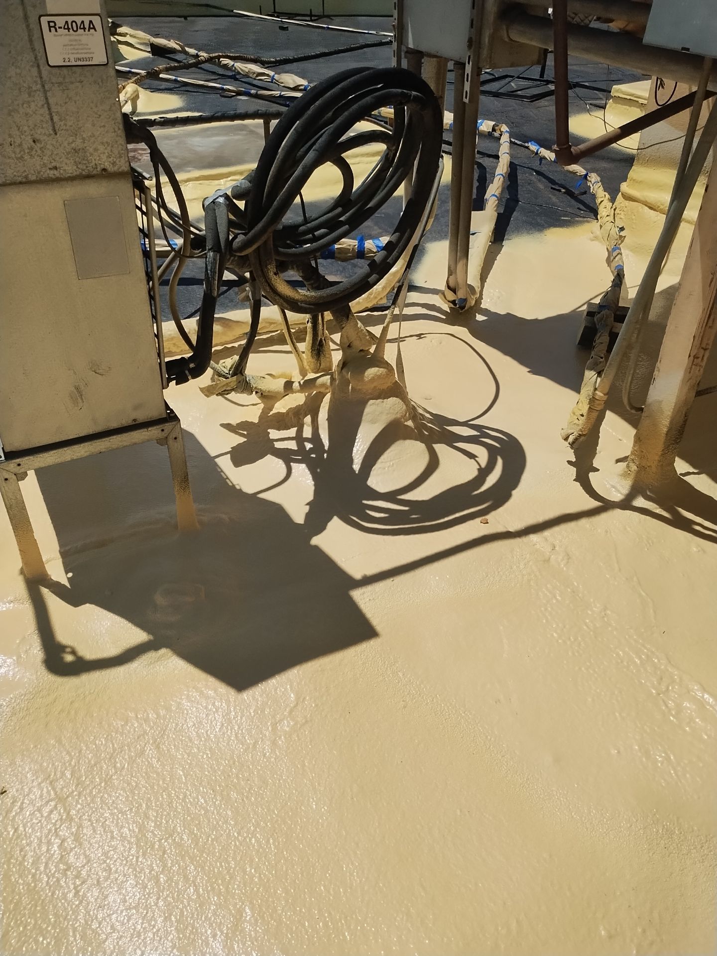 Spray foam and coatings using General Coatings acrylic coatings and spray foam by Straight Edge Roofing Inc