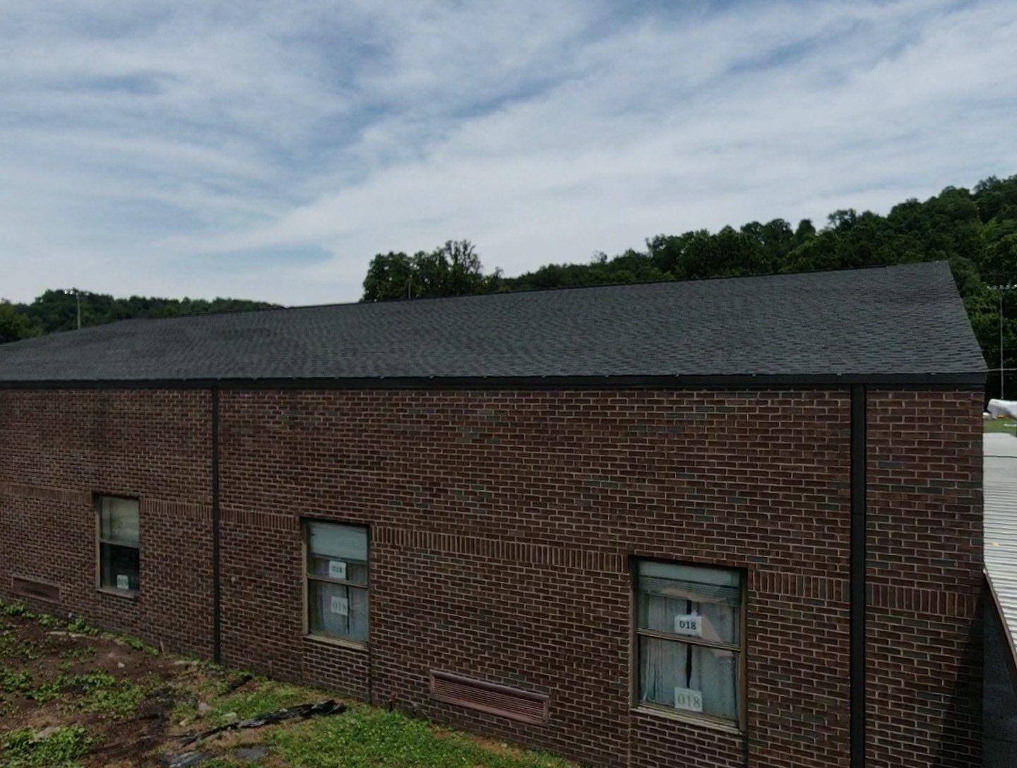 Commercial Roofing Installation using Performance Shingles by Mr. Roofer