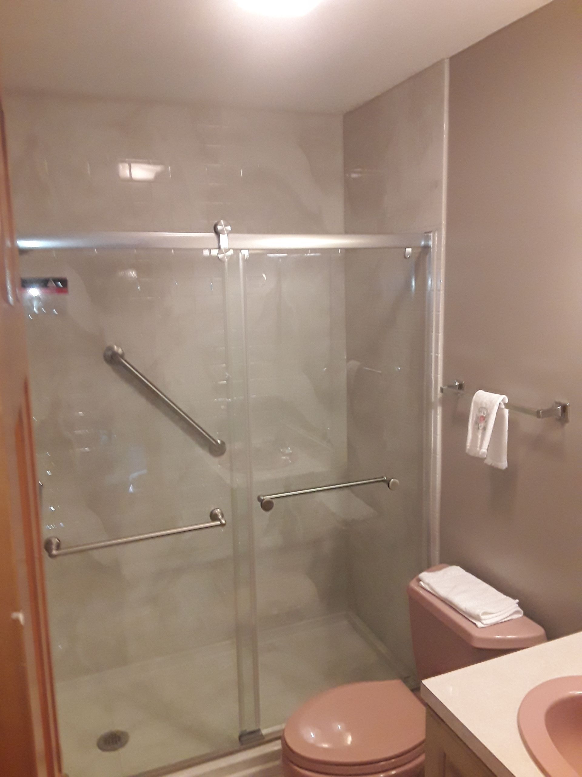 Tub to Shower Conversion using BCI Acrylic Shower System by Secure Construction Company Inc