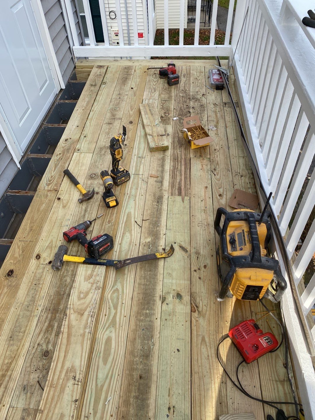 Deck Installation using Pressure treated railing by A Plus Exterior