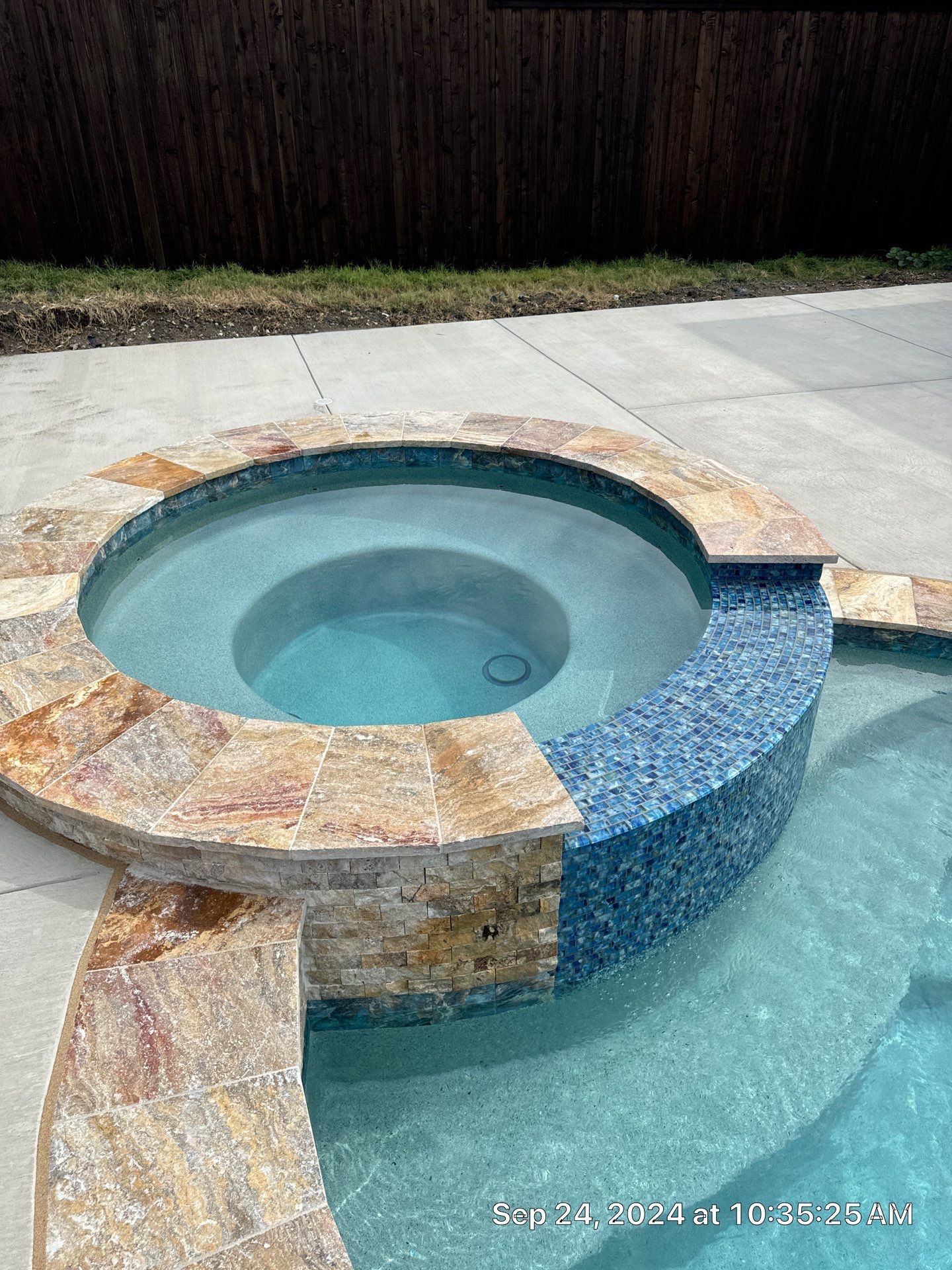 Freeform Pool with Raised Stone Spa by Pinnacle Pools and Spas - DFW