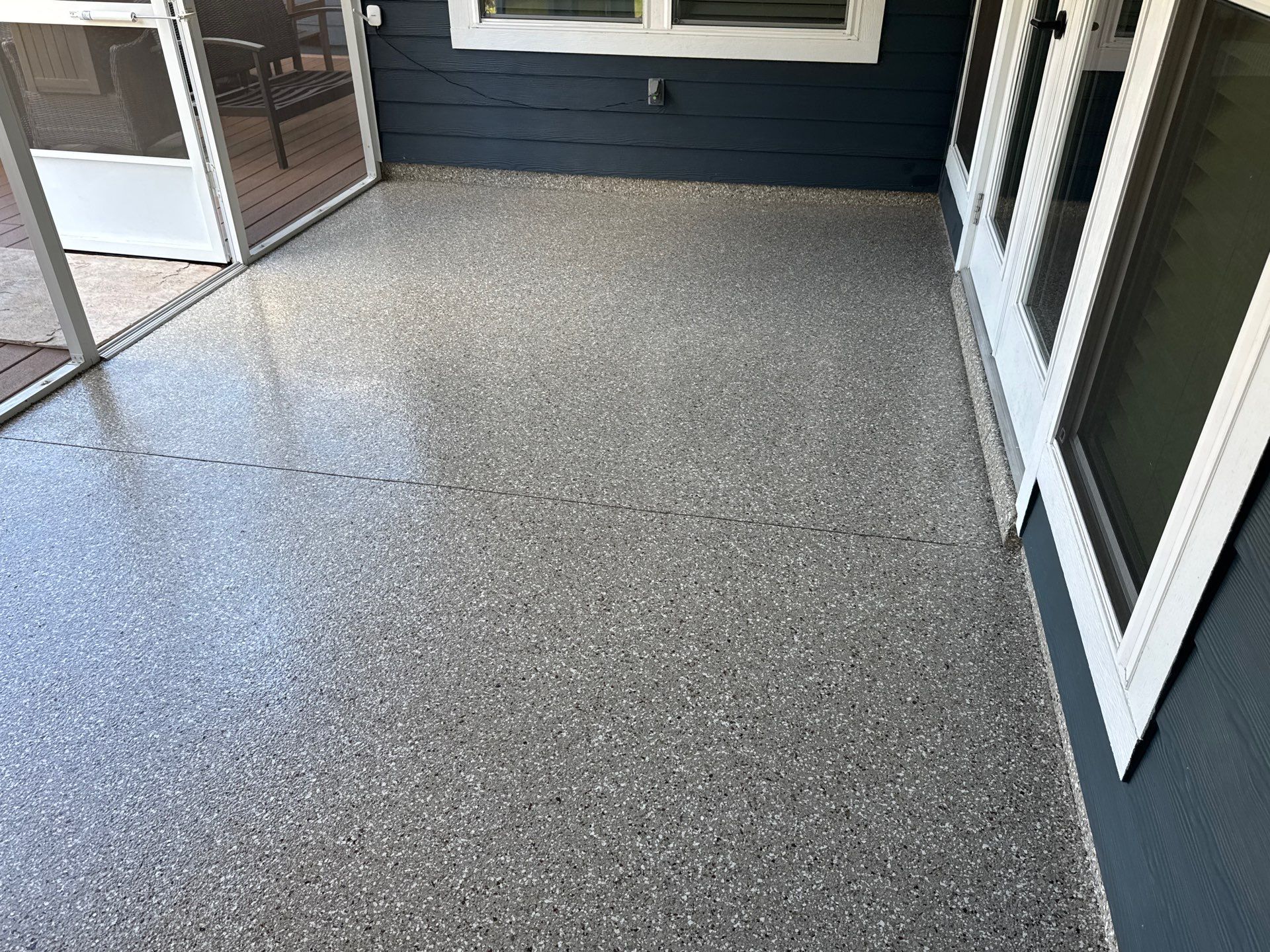 Front and Back Porches in Chiefland, FL in Pebble Beach by Cross Creek Concrete Coatings