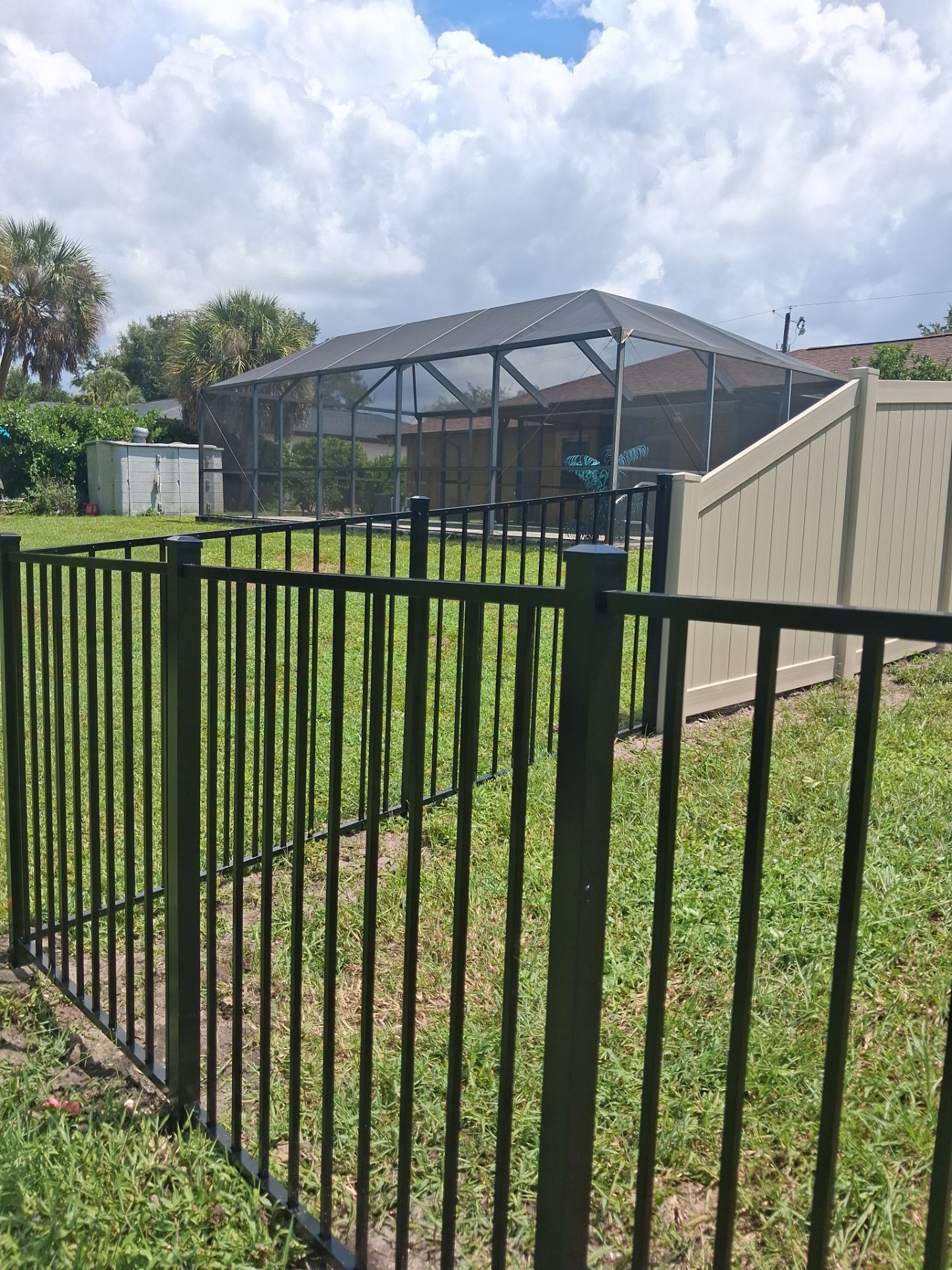 Vinyl Privacy Fencing and Aluminum Pool Security Installation in Port Charlotte by True Fence LLC