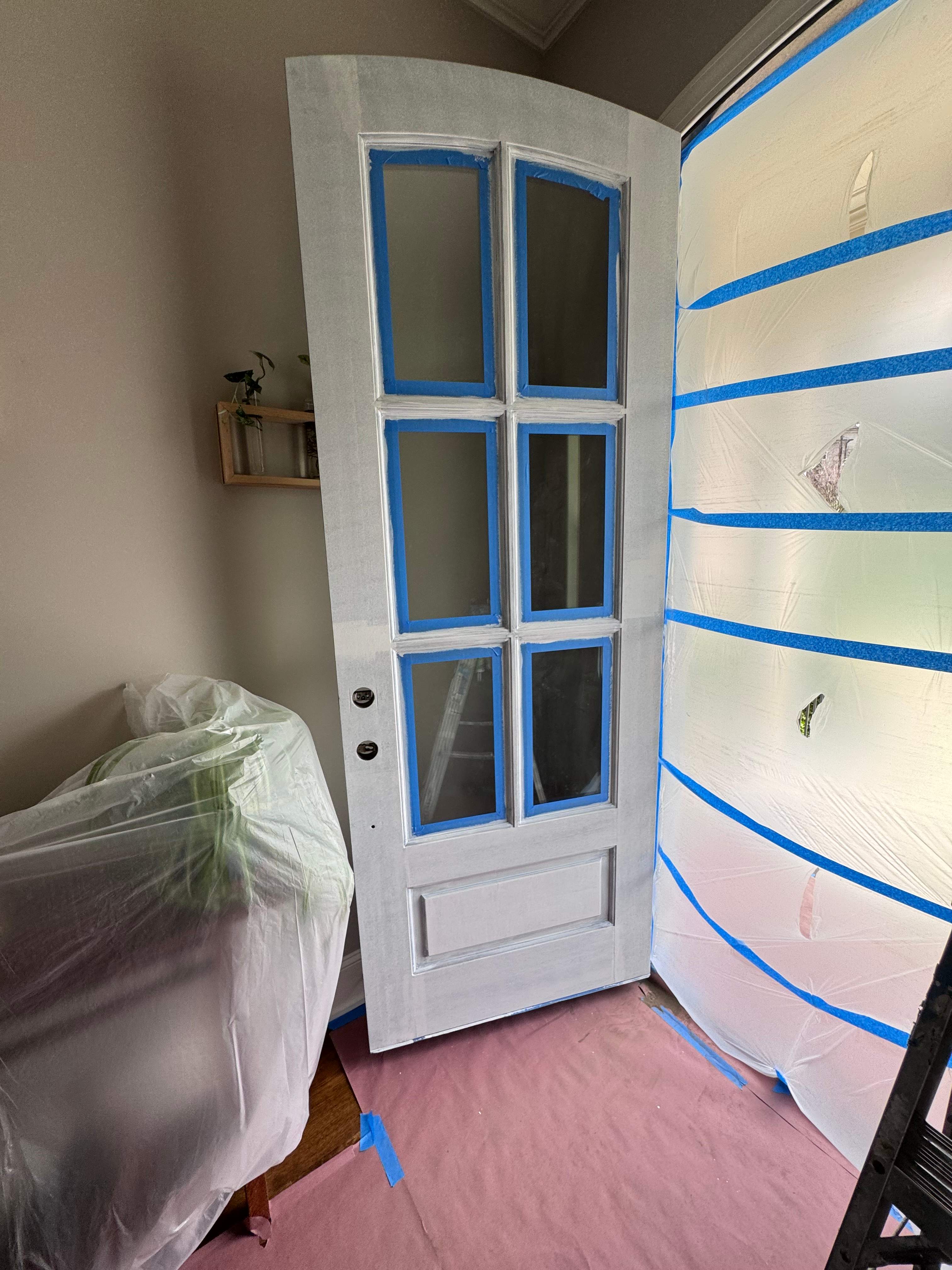 Front door change by GonzalezPainters & Contractors Inc 