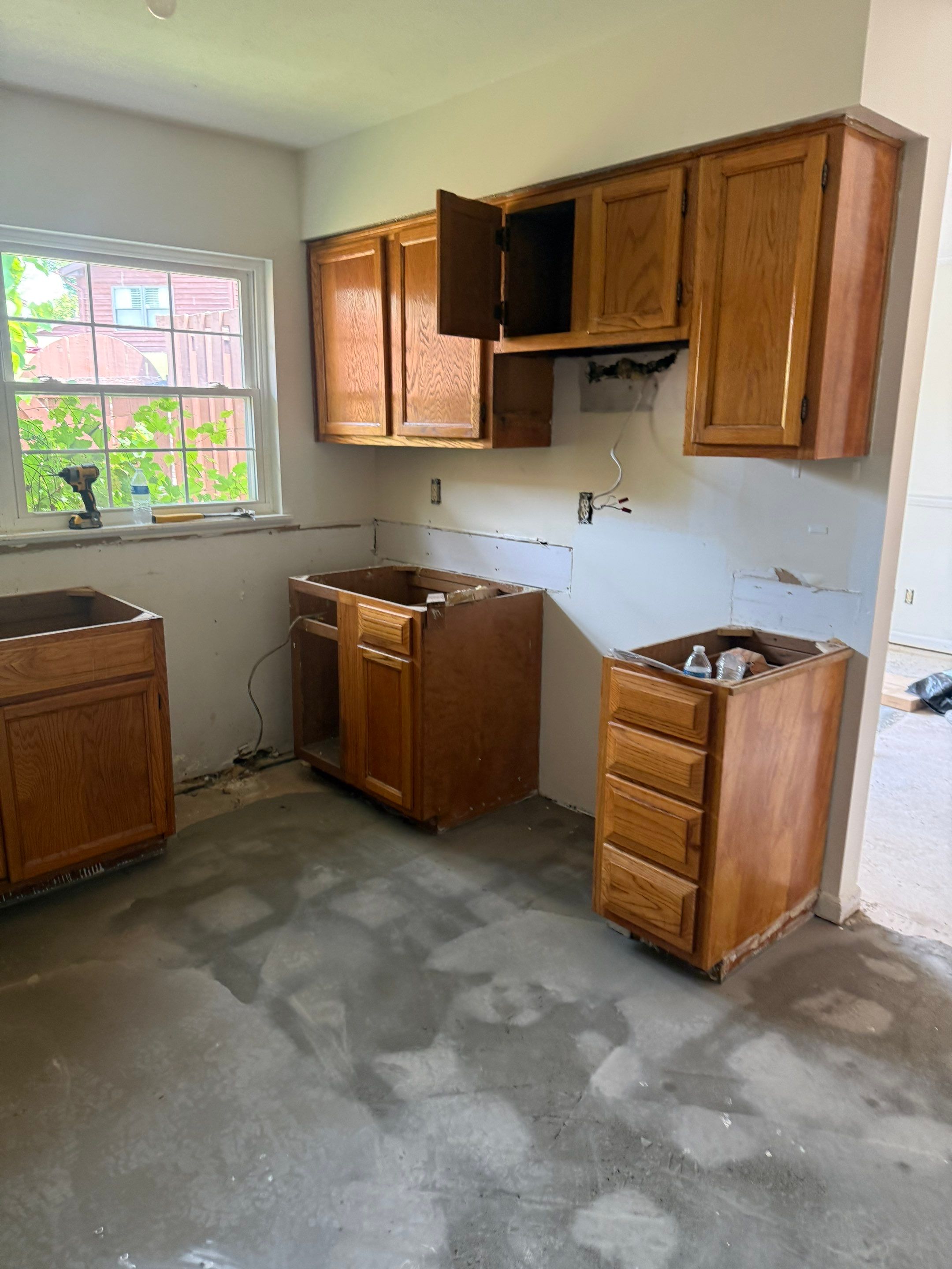 Complete Home Remodel Featuring Custom Kitchen and Wood-Look Plank Flooring by MAJO