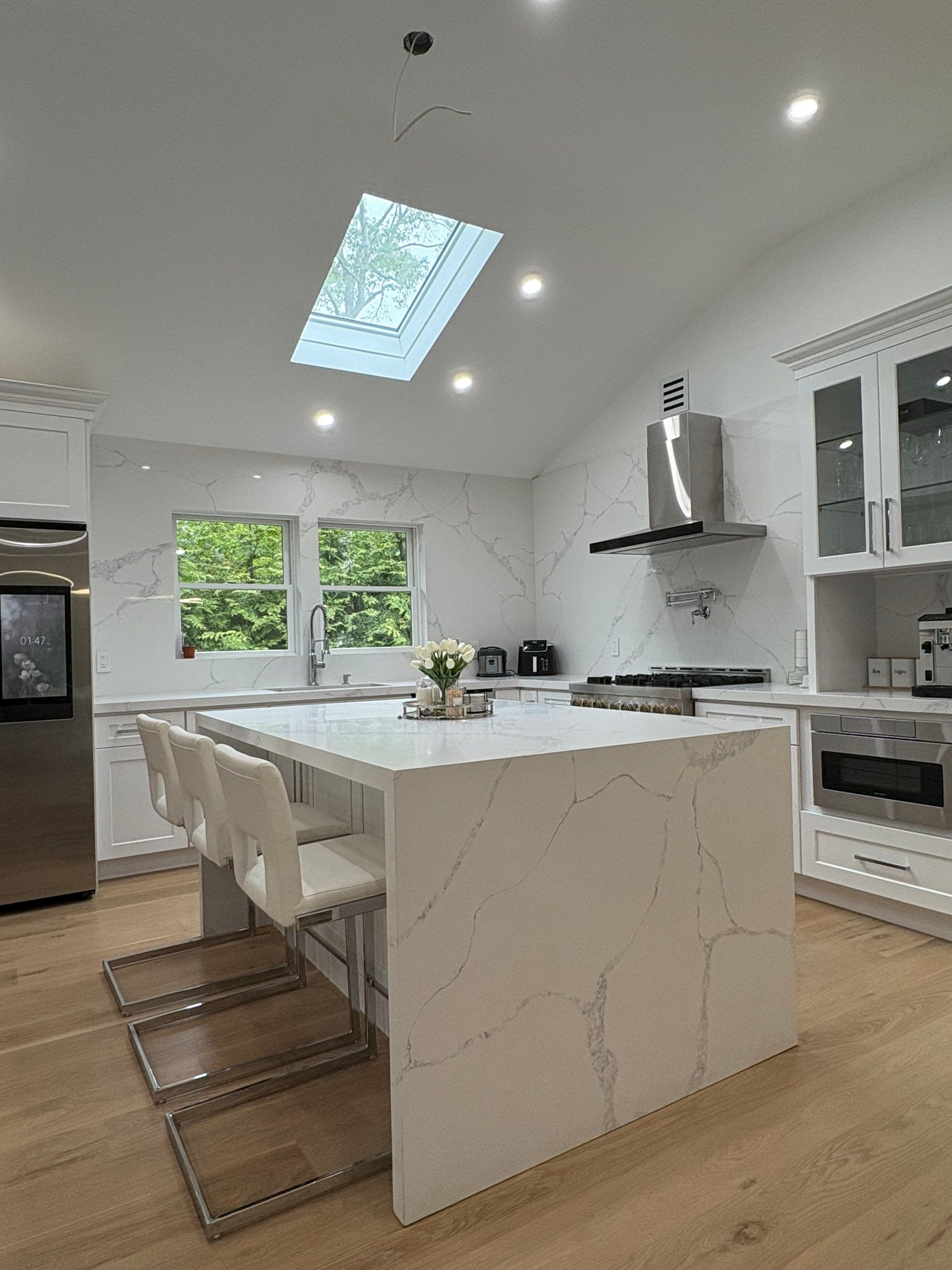 Cabinet Installation using white shaker by Antrax Corp