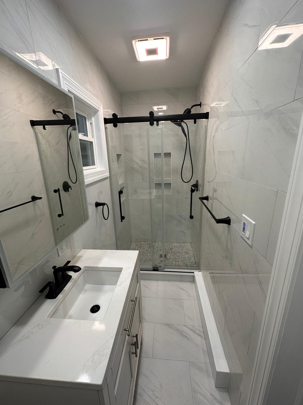 Bathroom Remodel using Tile by Home Concepts Construction