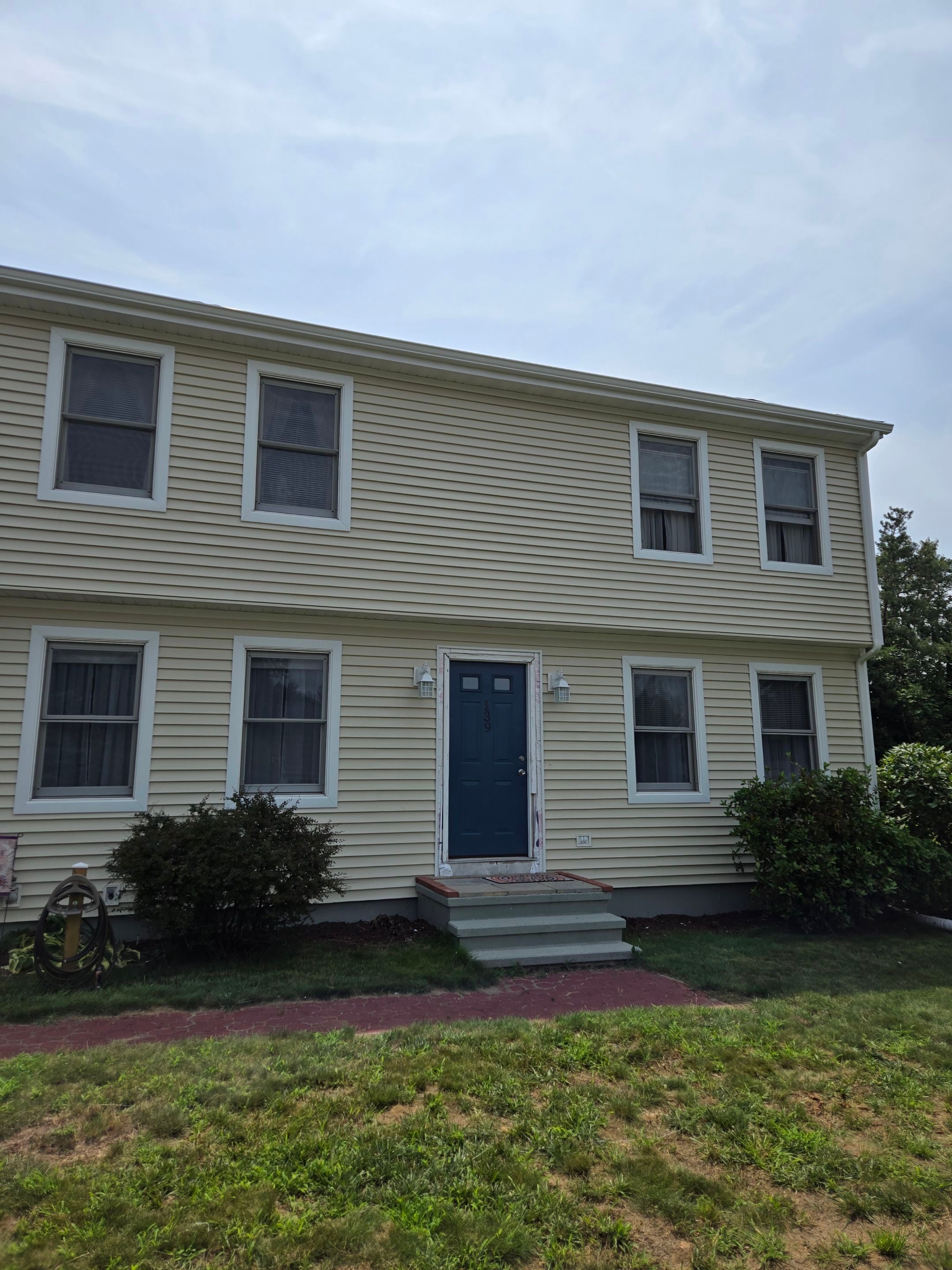 Siding Installation using CertainTeed Monogram Vinyl Siding - D4 - Desert Tan by A Plus Exterior