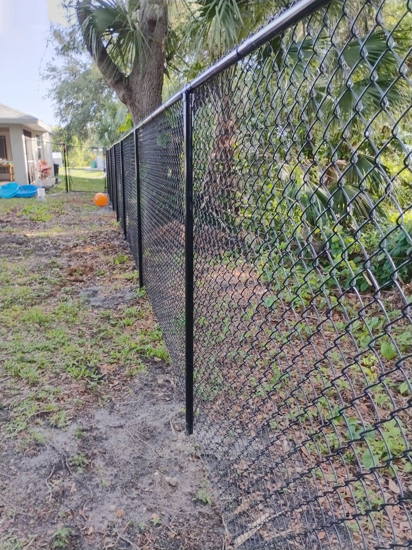 Black Chain Link in Port Charlotte by True Fence LLC