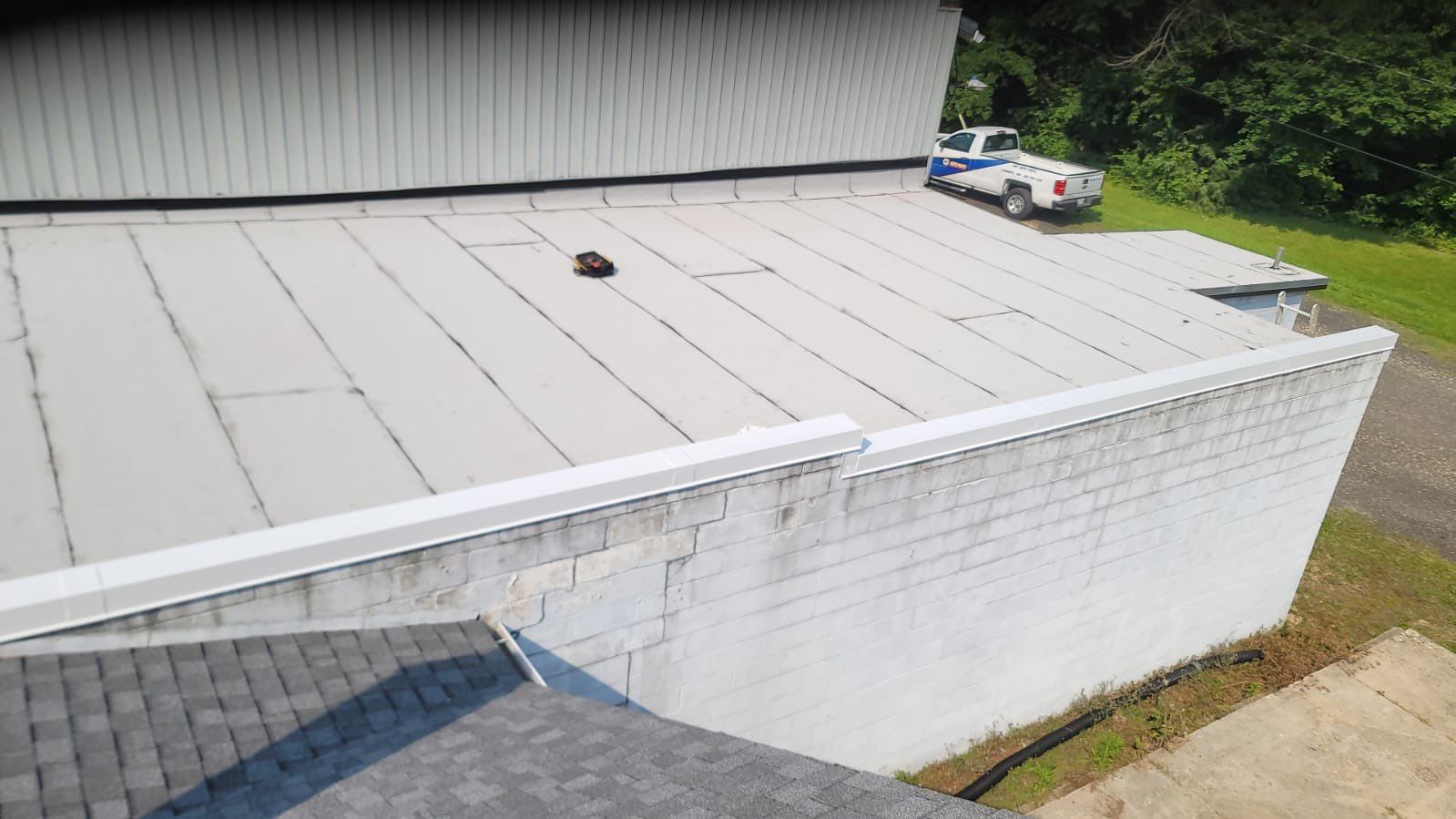Roof Installation using Silicone APP Elevate Coating by ExteriorPros