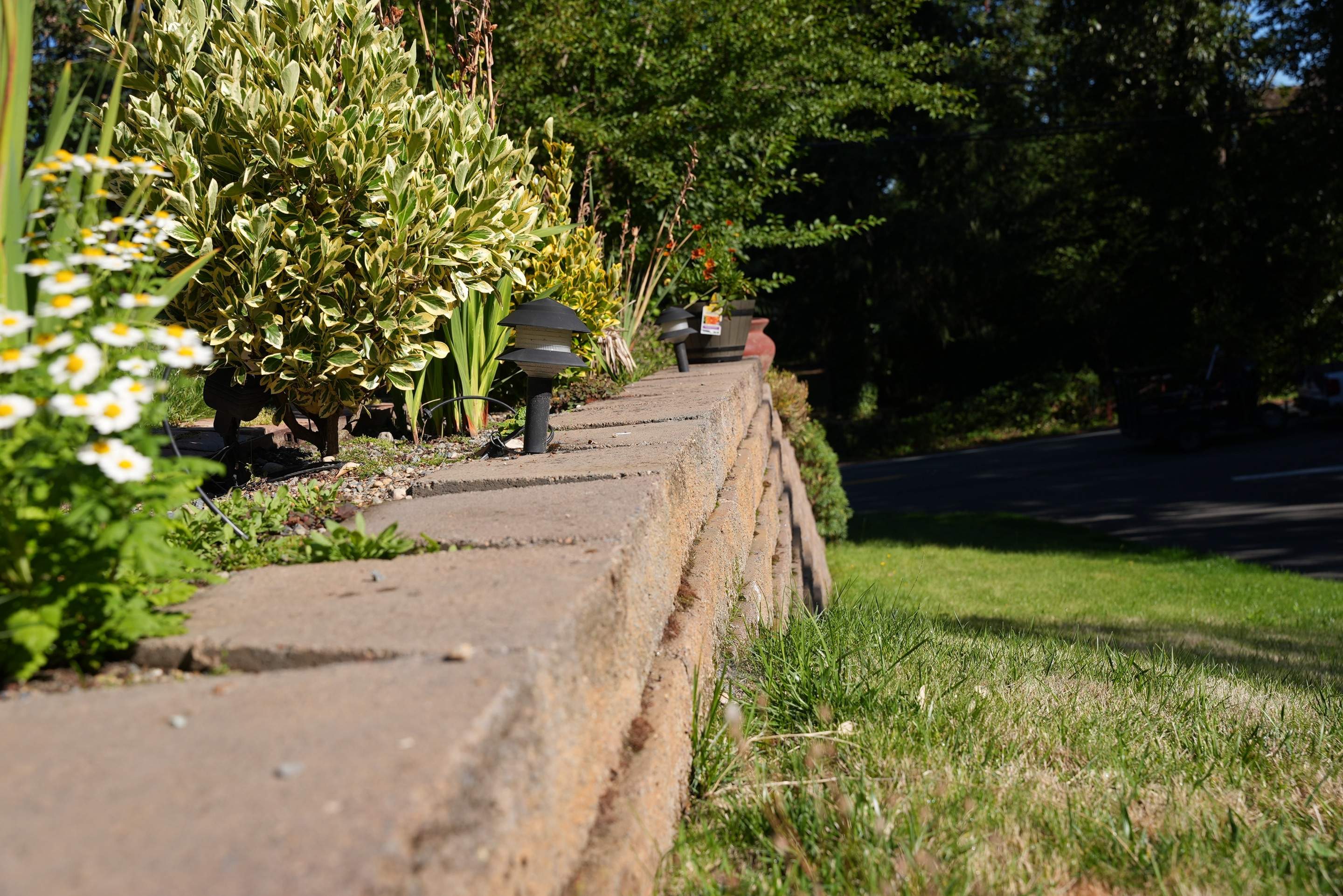 Mehta | Tiled Driveway with Sealer & Retaining Wall  by Jireh Asphalt & Concrete Inc 