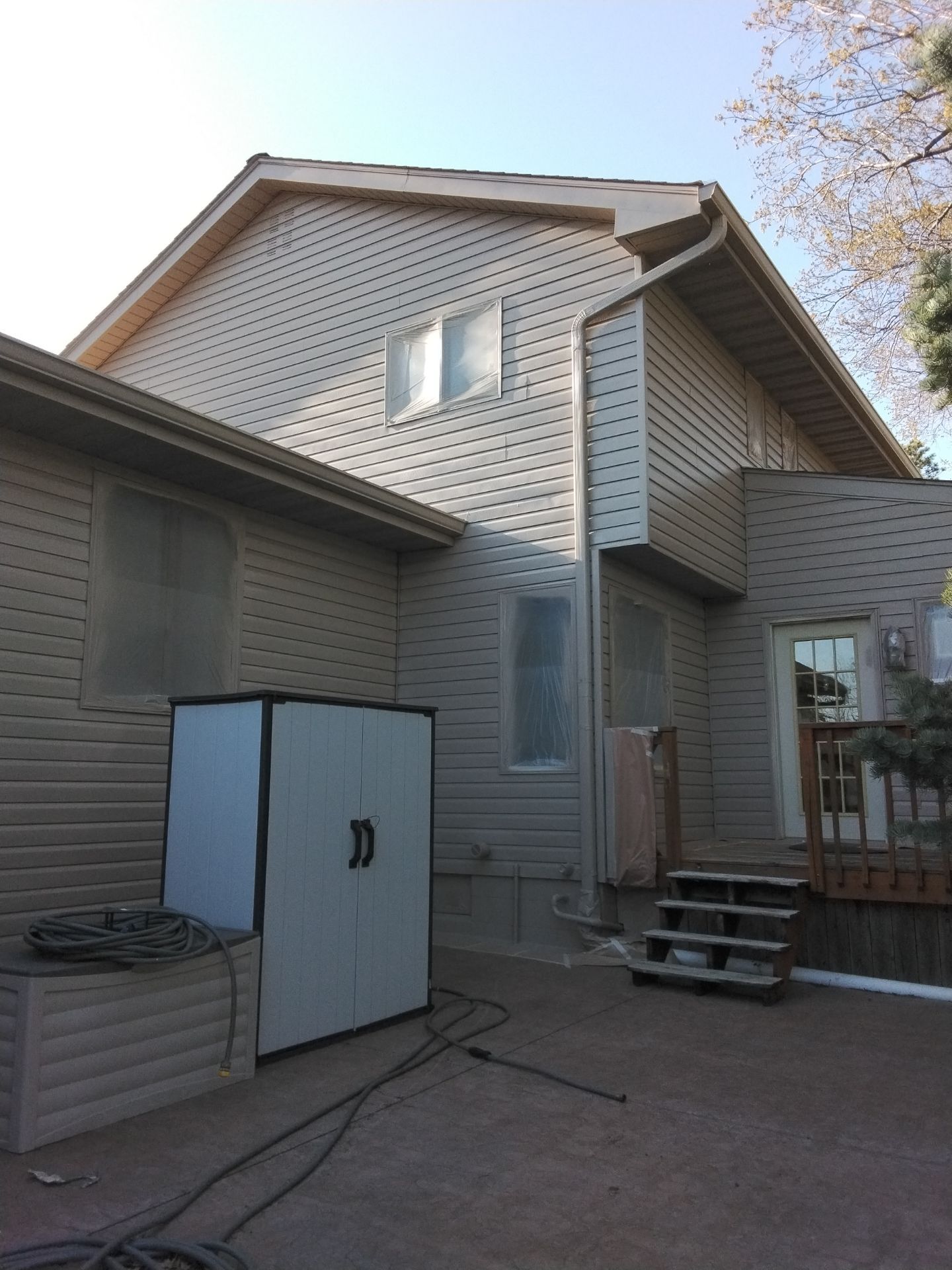 Residential Exterior Repaint Including Shop and Shed  by Midwest Paint LLC