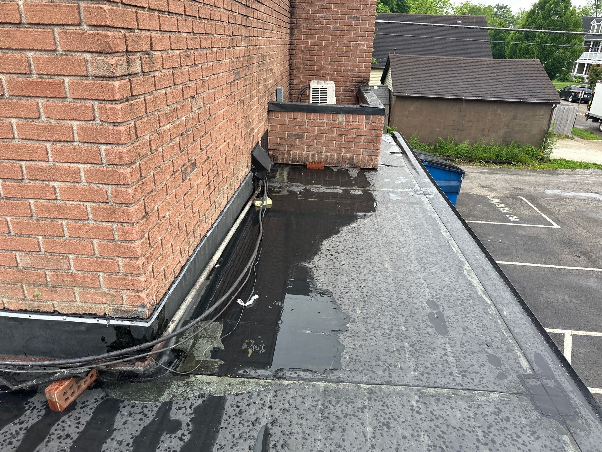 Commercial Roofing Installation using 60 mil rubber roof  by Nitro Roofing and Construction