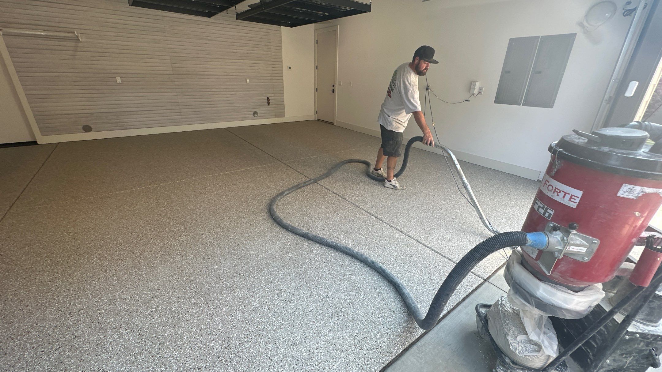 Garage Transformation using Pebble Beach by Croc Coatings, LLC