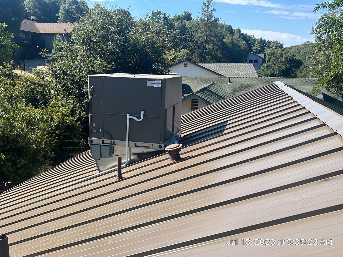 Metal roofing installation using ASC Standing Seam metal by Straight Edge Roofing Inc