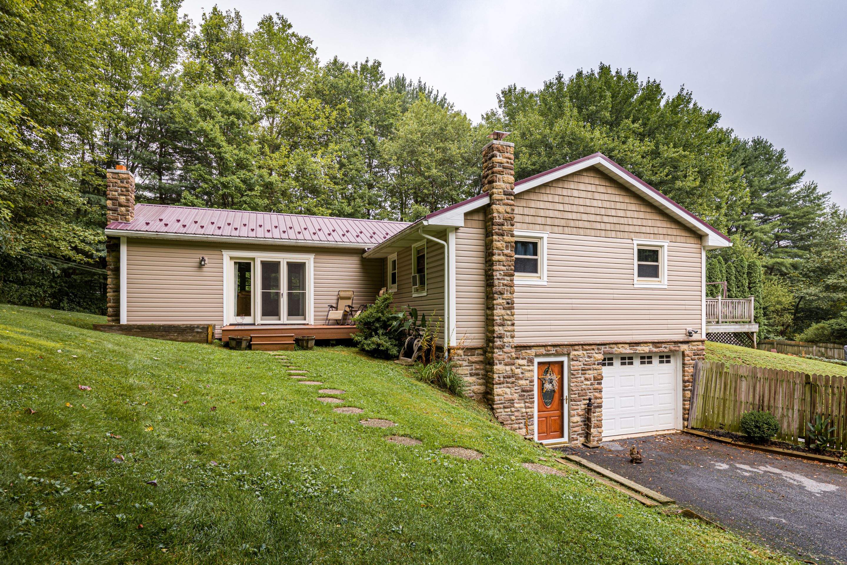 Vinyl Siding- by Esh Builders