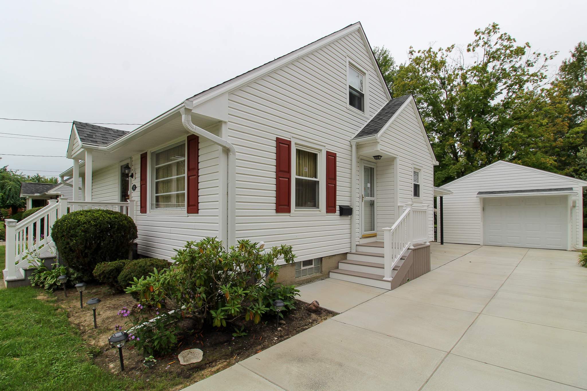 Exterior Renovations- Roofing, Siding, Concrete, and Railings  by Ivy Lea Construction