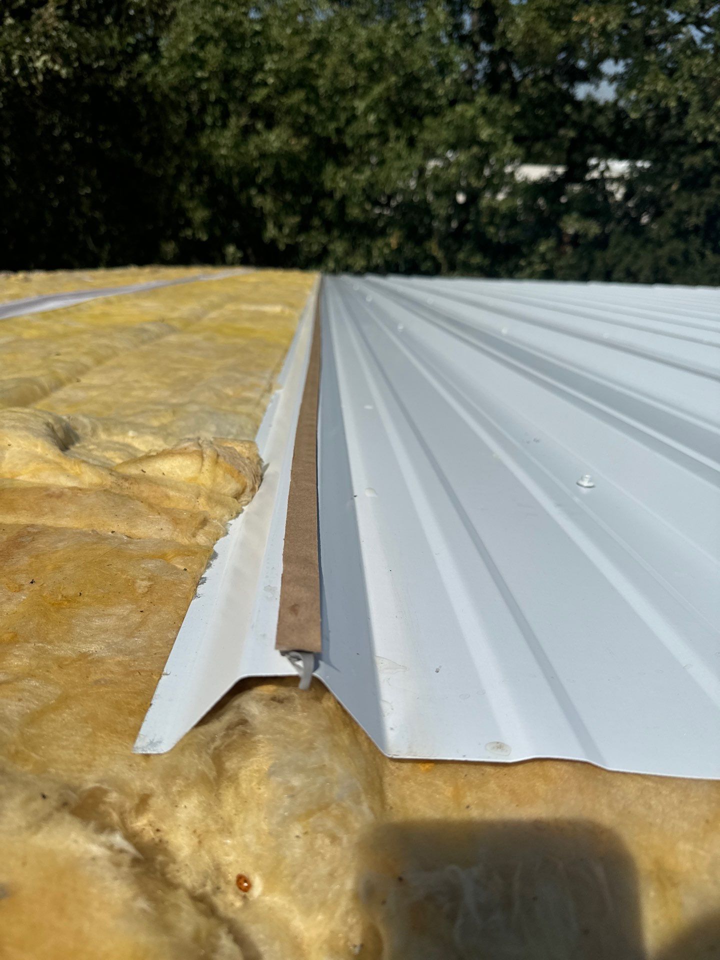 R-Panel Replacement by First Out Roofing 