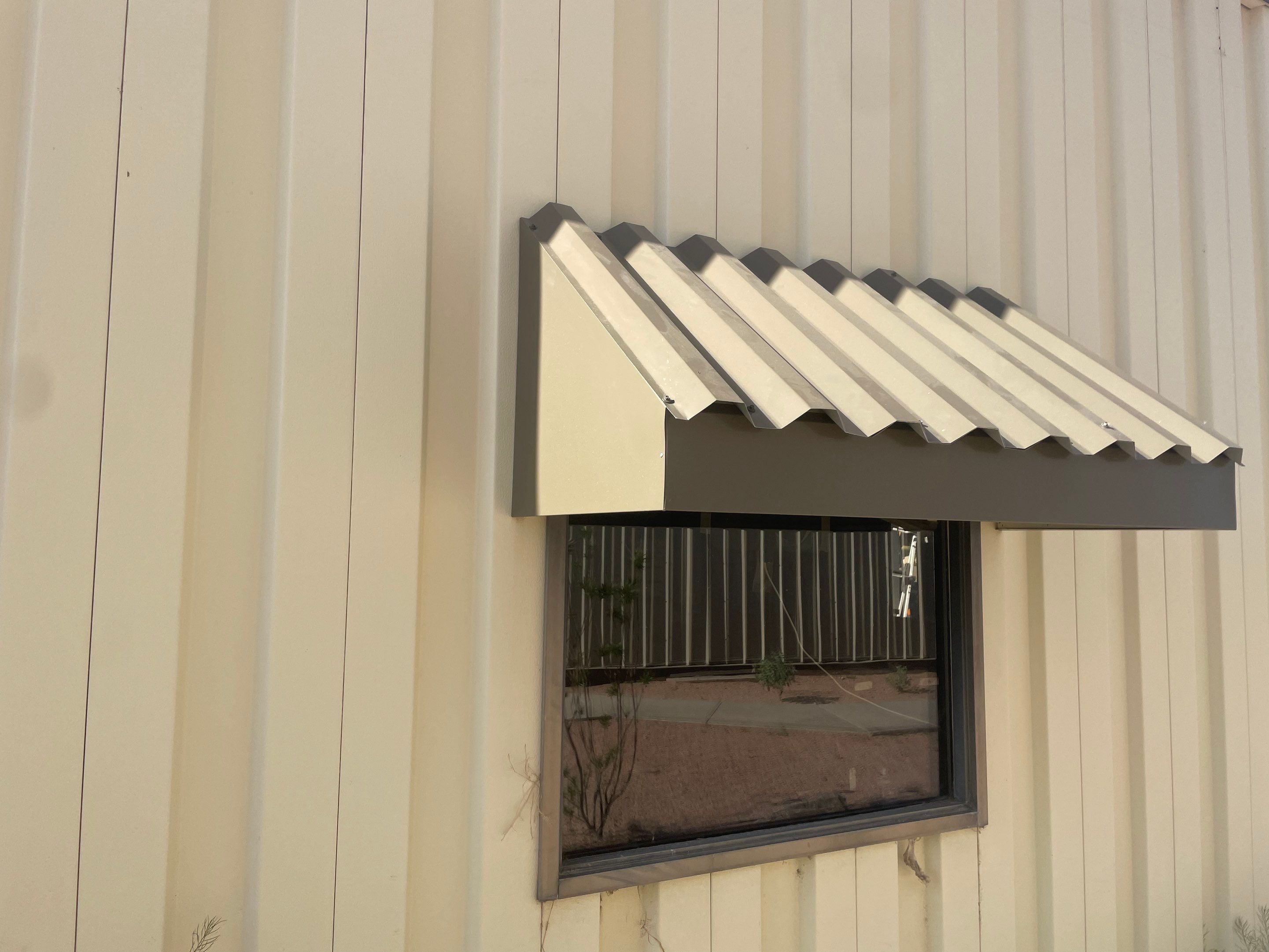 Saddle Tan Standing Seam by Reimagine Roofing