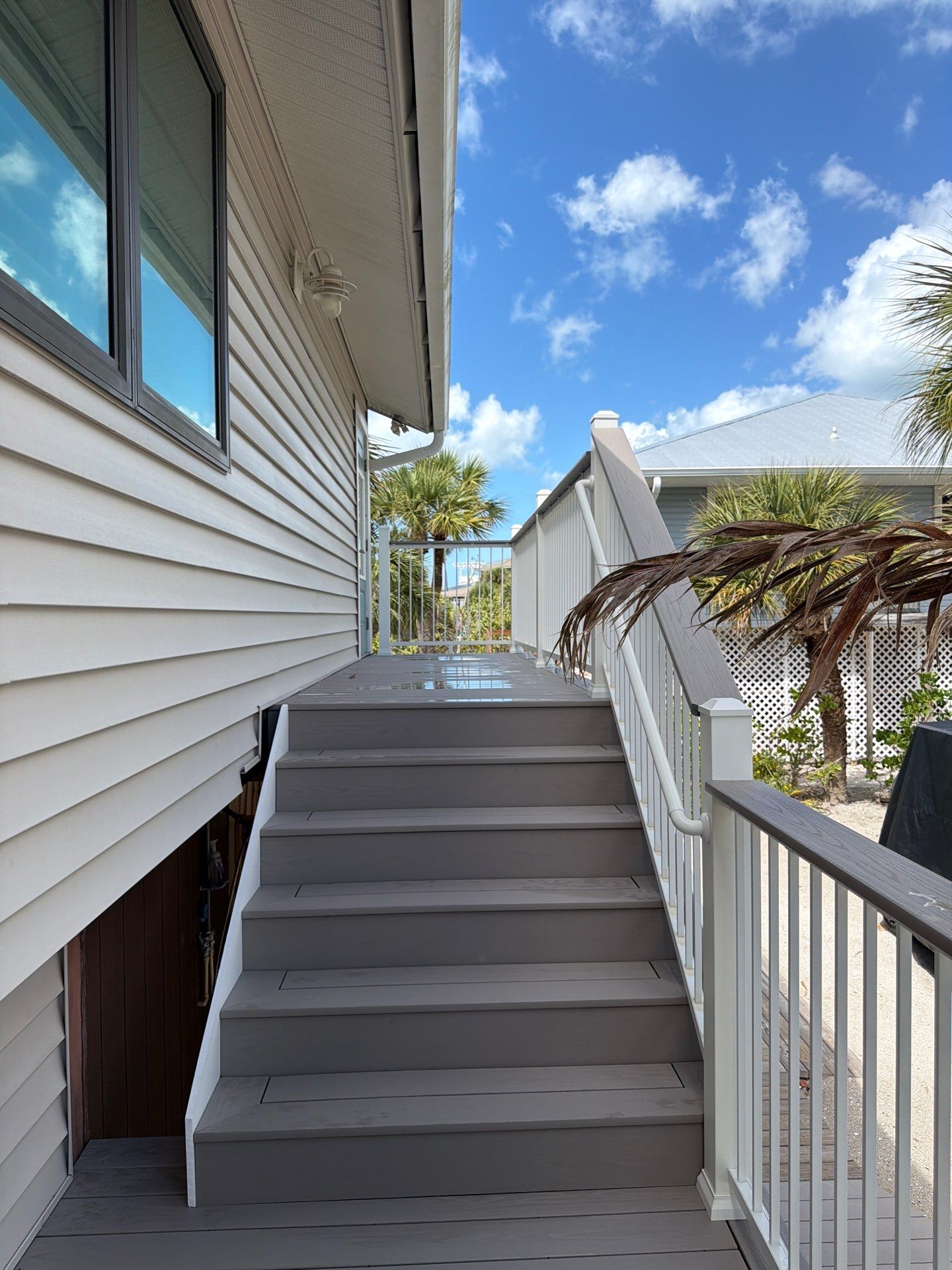Elevated Deck and Composite Staircase Replacement in Placida Florida by Smirnov Construction Inc