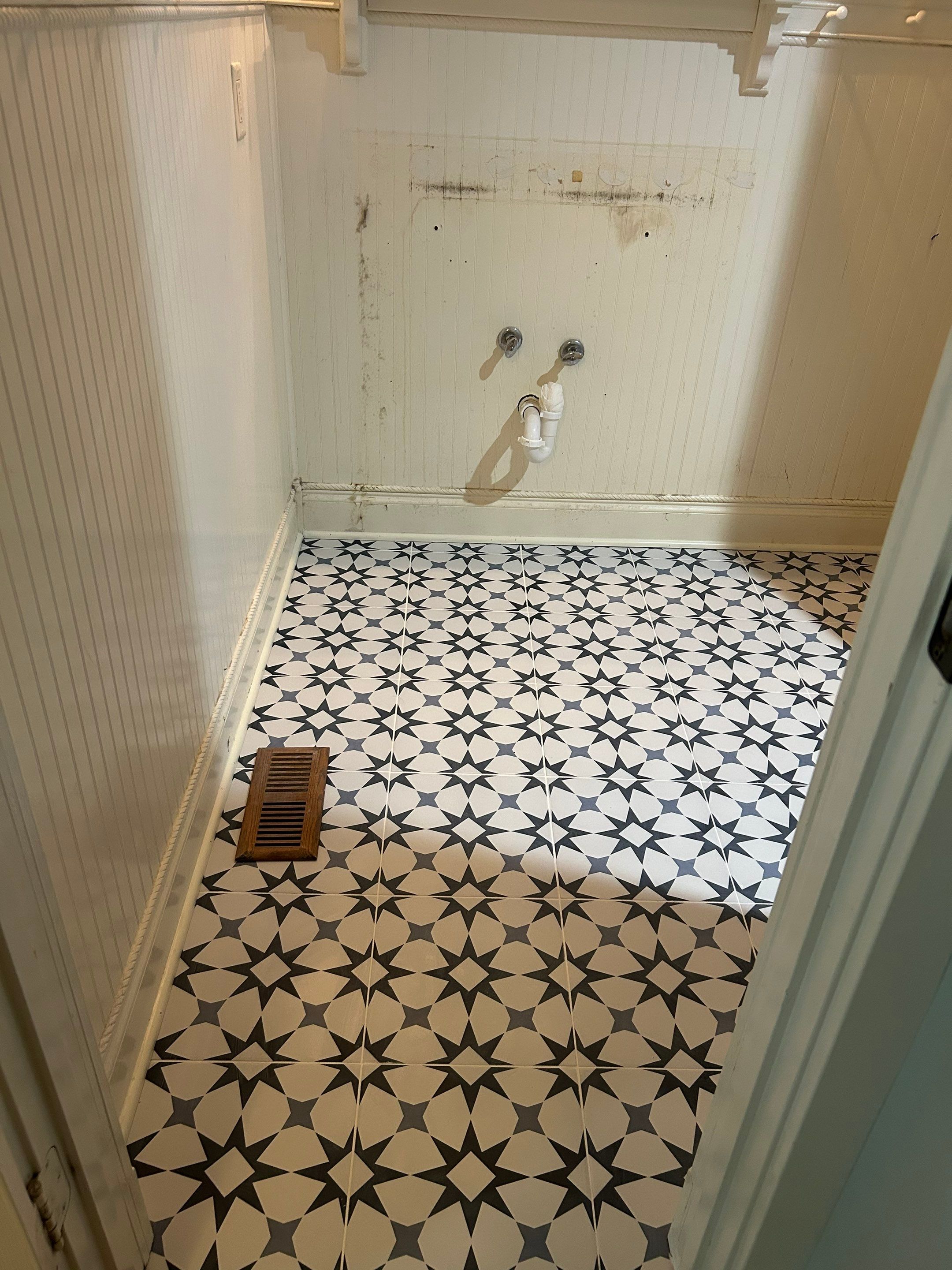 Tile shower and floor by Footprints Floors of Nashville