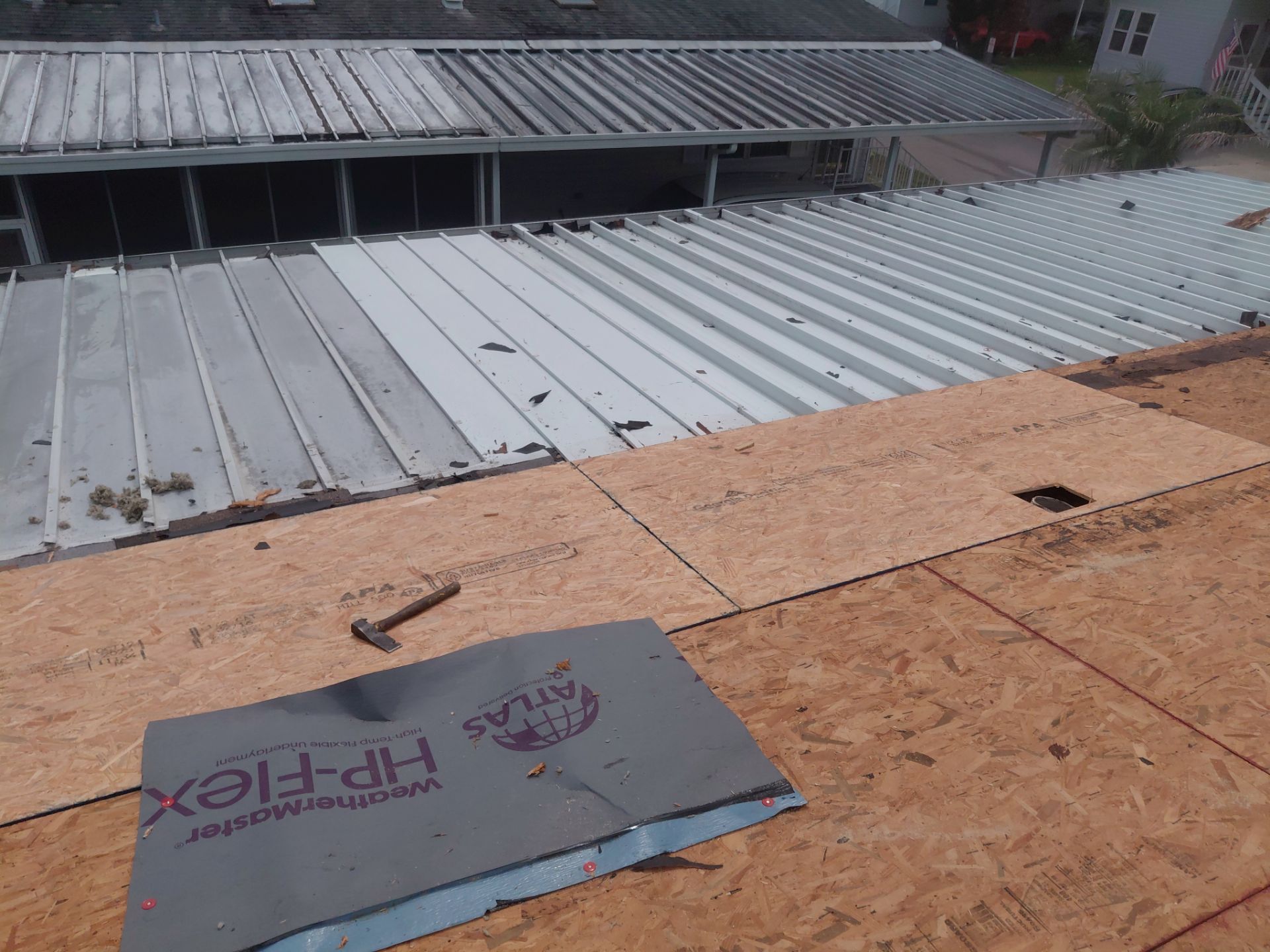 Orlando Residential Standing Seam Metal Roof Installation in Light Stone by Pinnacle Roofing Group