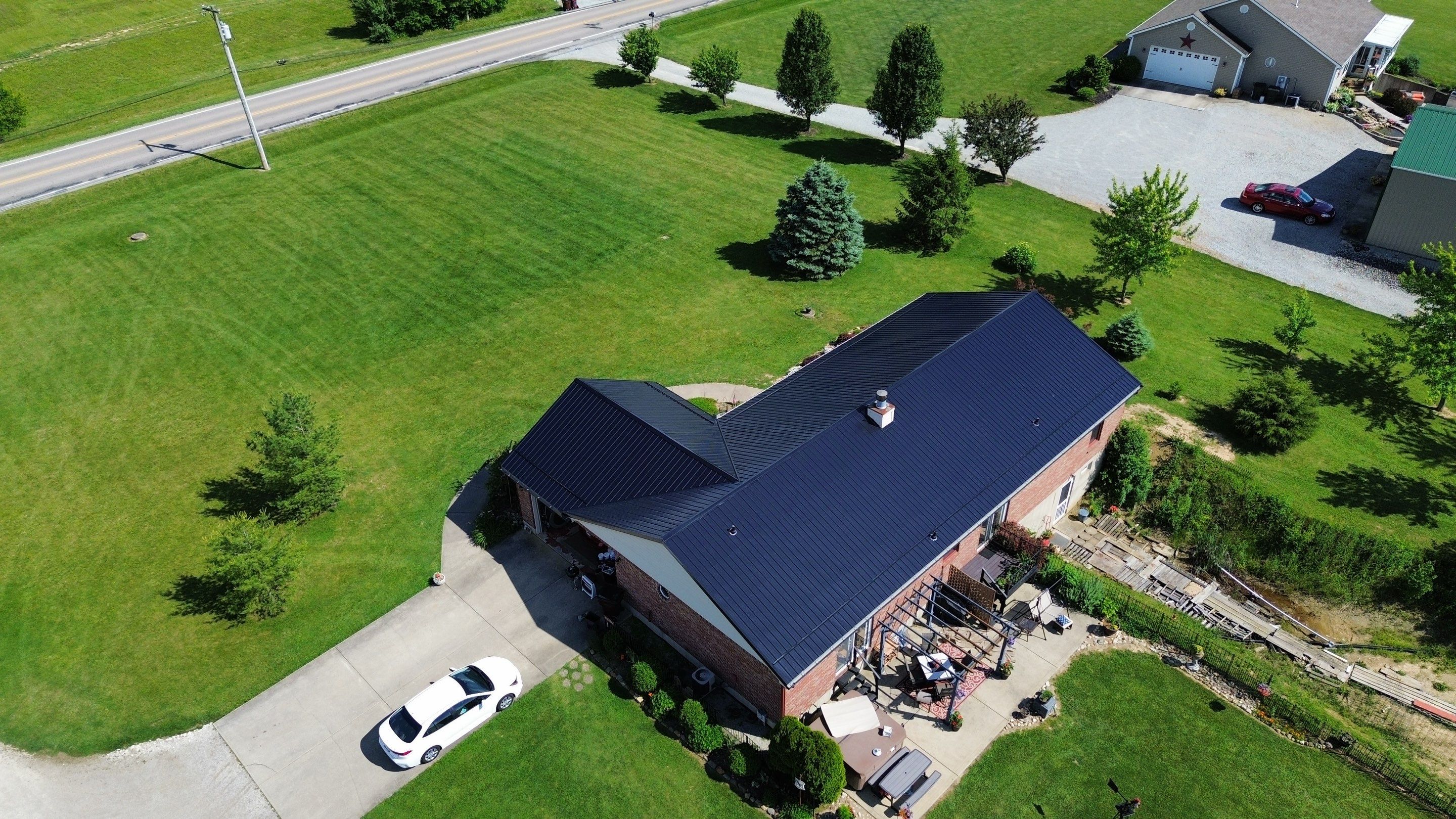 Residential Roofing Installation using Perfromance Panel Metal - Black by RoofX 