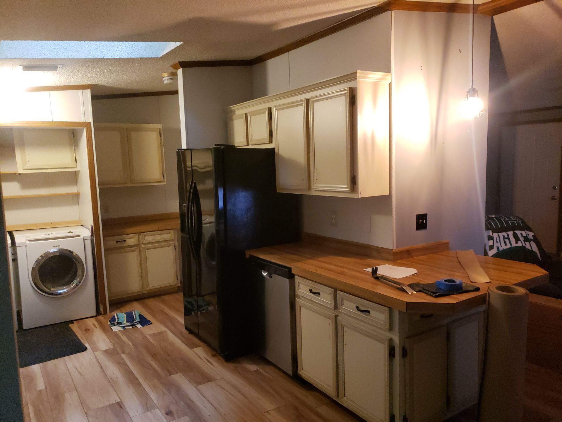 Stunning Kitchen Transformation with Raw Hickory Cabinets by A Step Above Handy LLC 