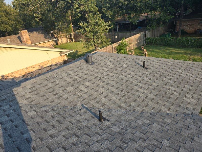 New Roof and Exterior Paint by Harvey Roofing & Construction