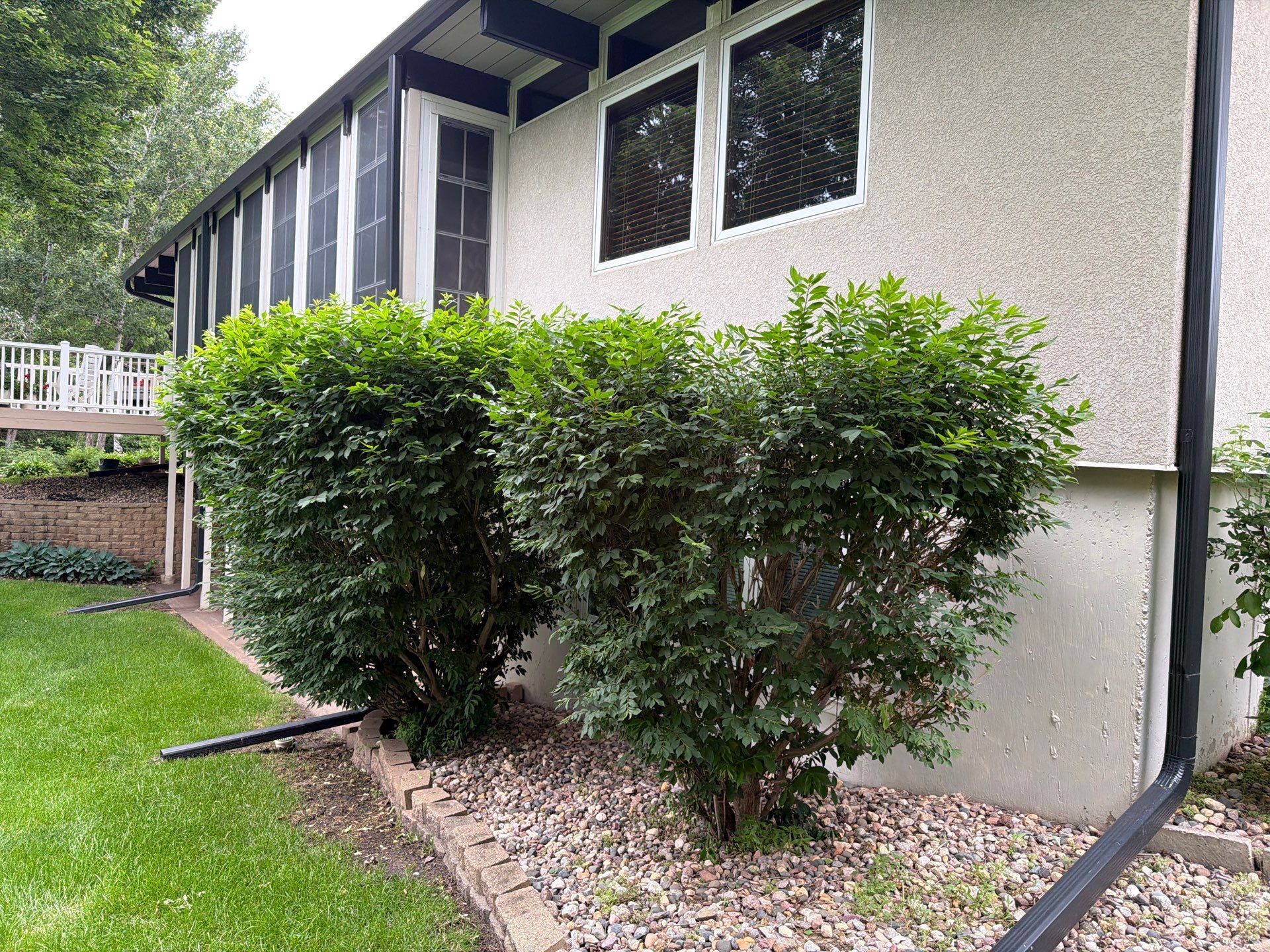 Exterior Trim Painting and Rafter Staining in Sioux Falls by Select Painting, Coatings & Garage Cabinets