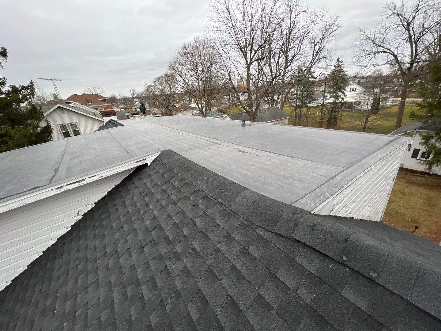 Residential Roofing Installation using 60 mil rubber roof by Nitro Roofing and Construction