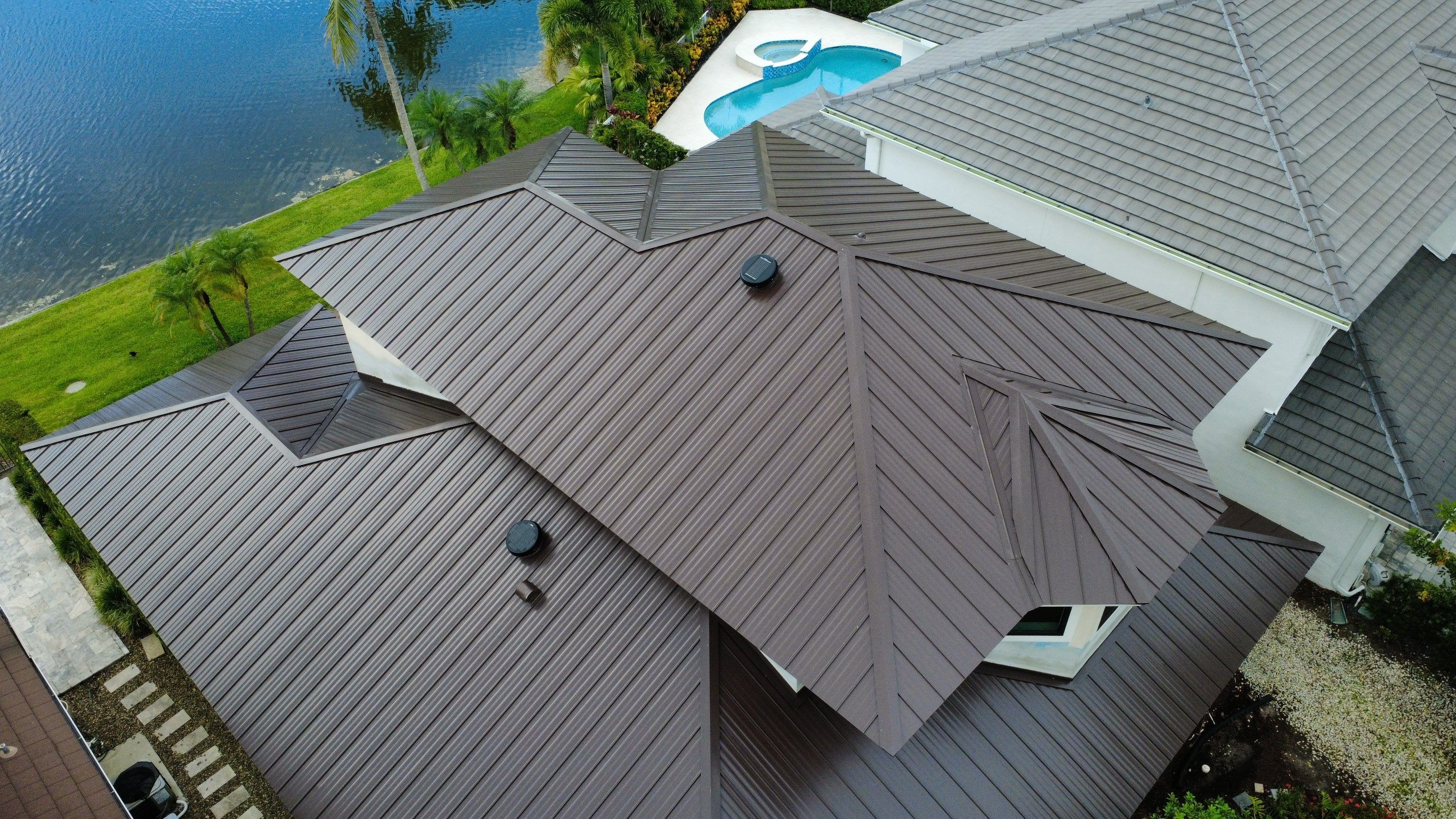 Residential Roofing Installation using 1" Nail strip metal roof by BLUES BROTHERS ROOFING