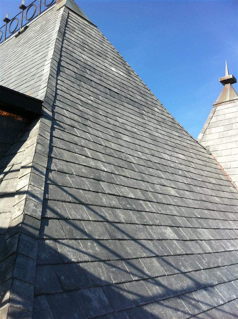 Historic Building ROOF REPLACEMNT with GAF TruSlate  on steep slop and Versico 60mil TPO on flat roof by Gorilla Exteriors Contracting, LLC